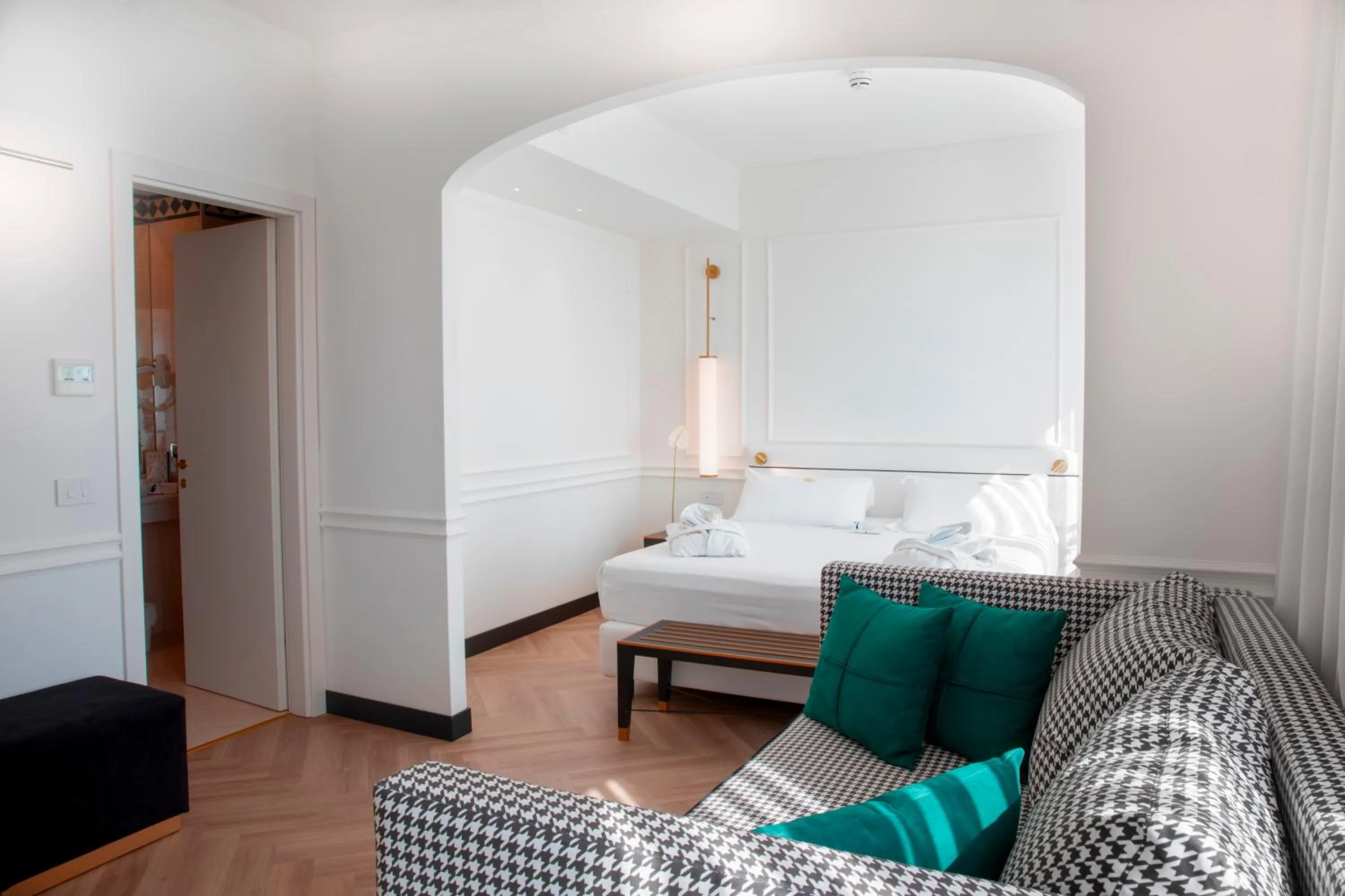 Living room, Bed in Hotel De Londres