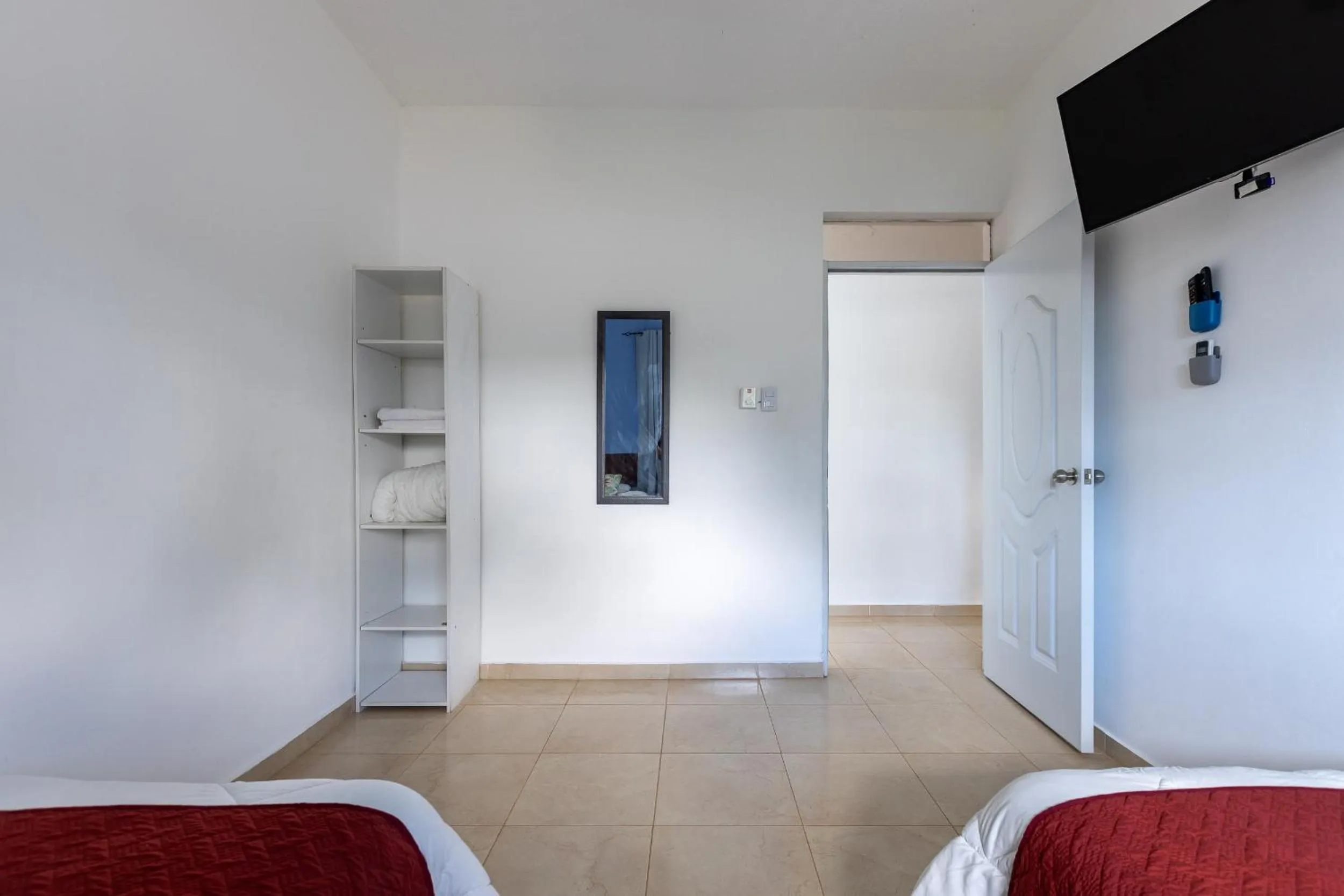 Bed in EDMA APARTAHOTEL