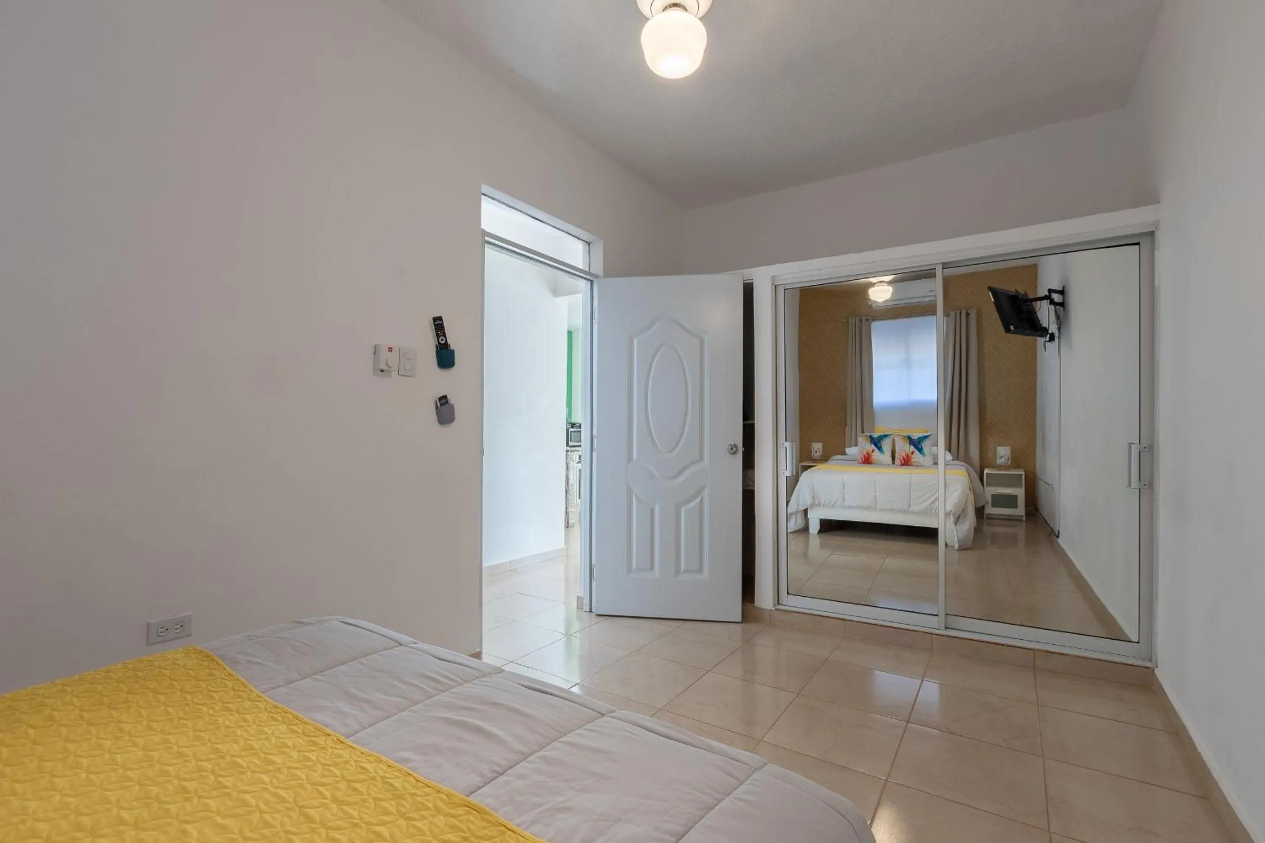 Bed in EDMA APARTAHOTEL