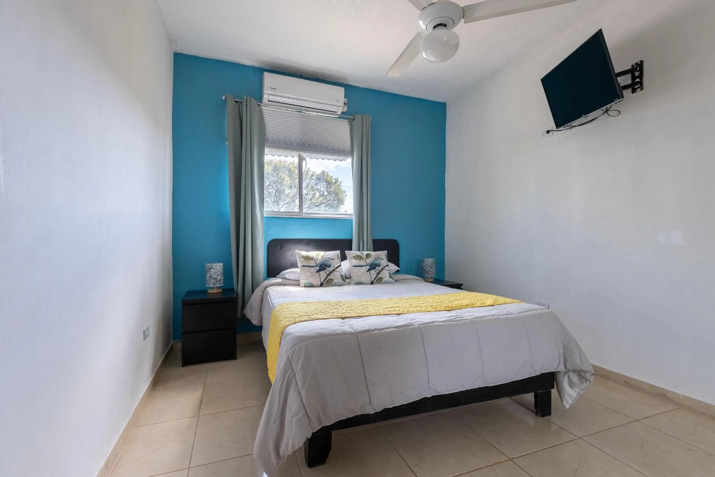 Bed in EDMA APARTAHOTEL