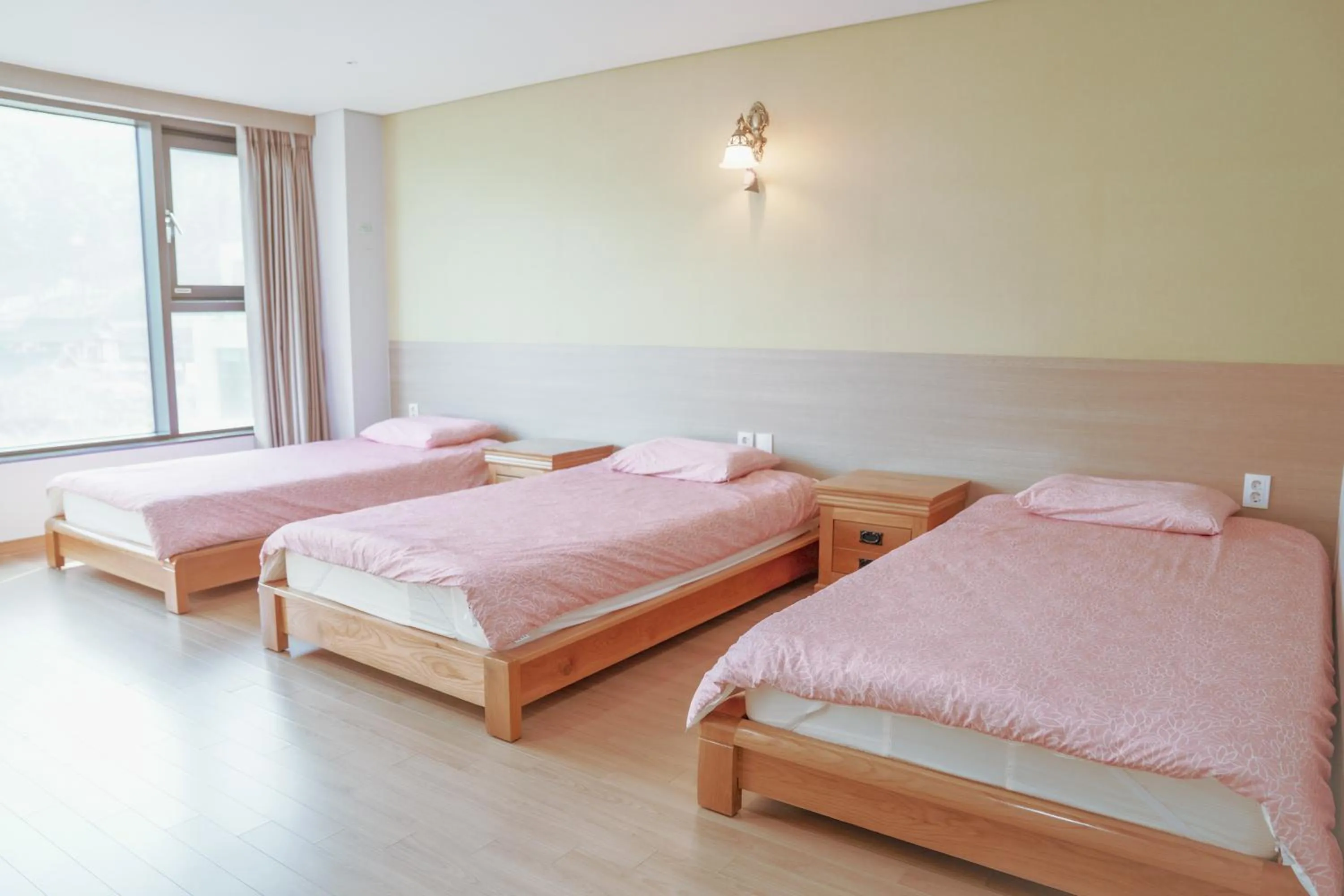 Bed in Sancheong Korean Medicine Family Hotel