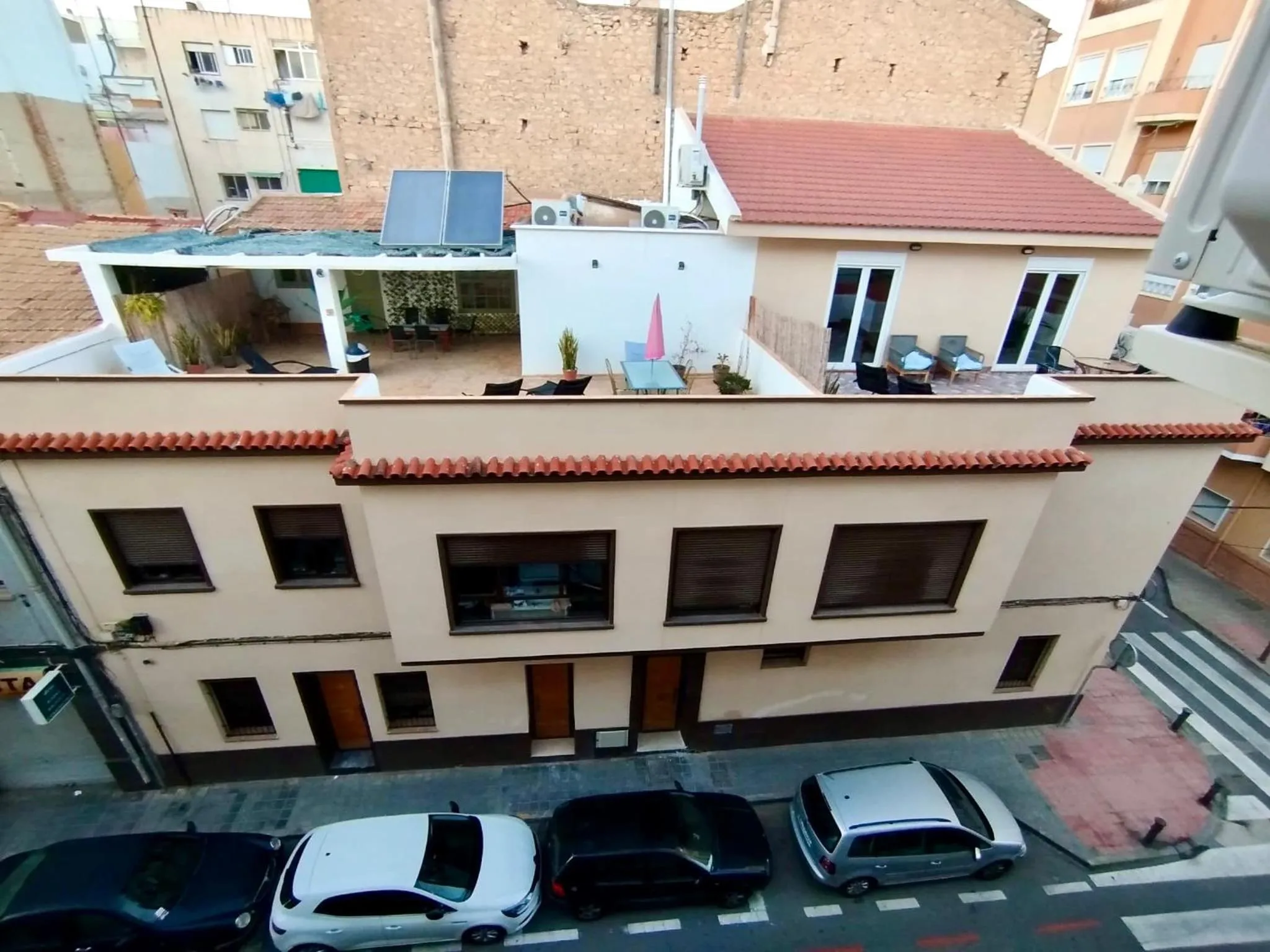 Property building in Soho Boho Apartments - with sunny rooftop terrace and fiber optic internet