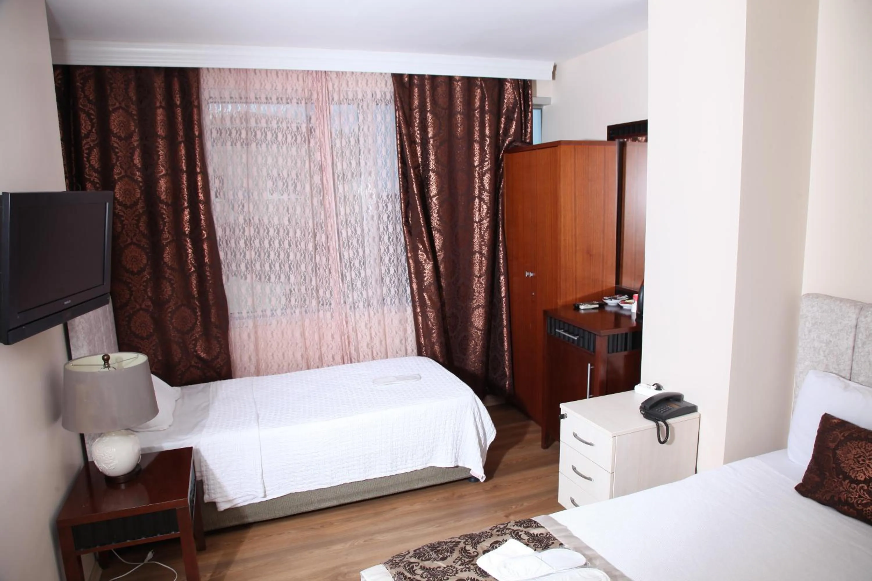 Bed in Çamlıca Tower Hotel