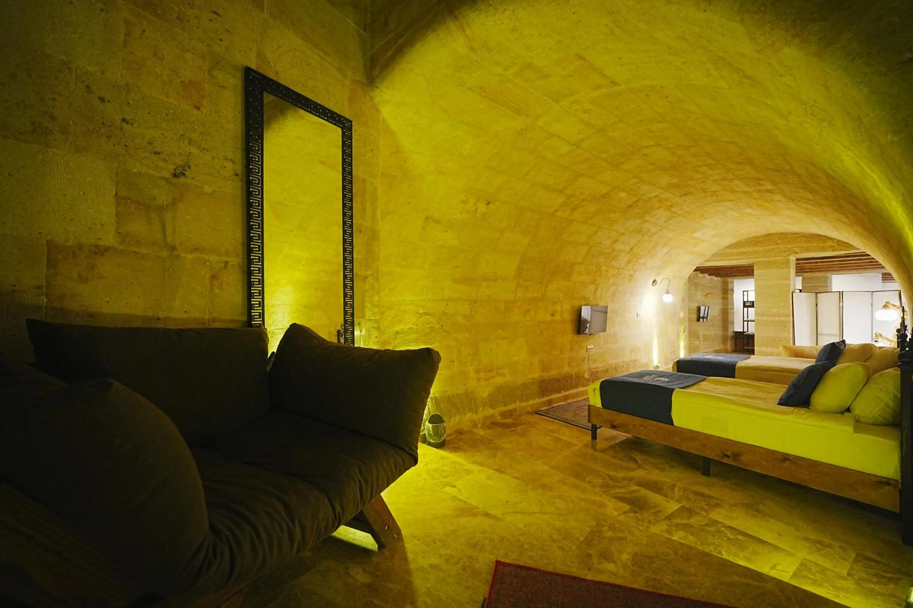 Bed in Kayra Cave Suites