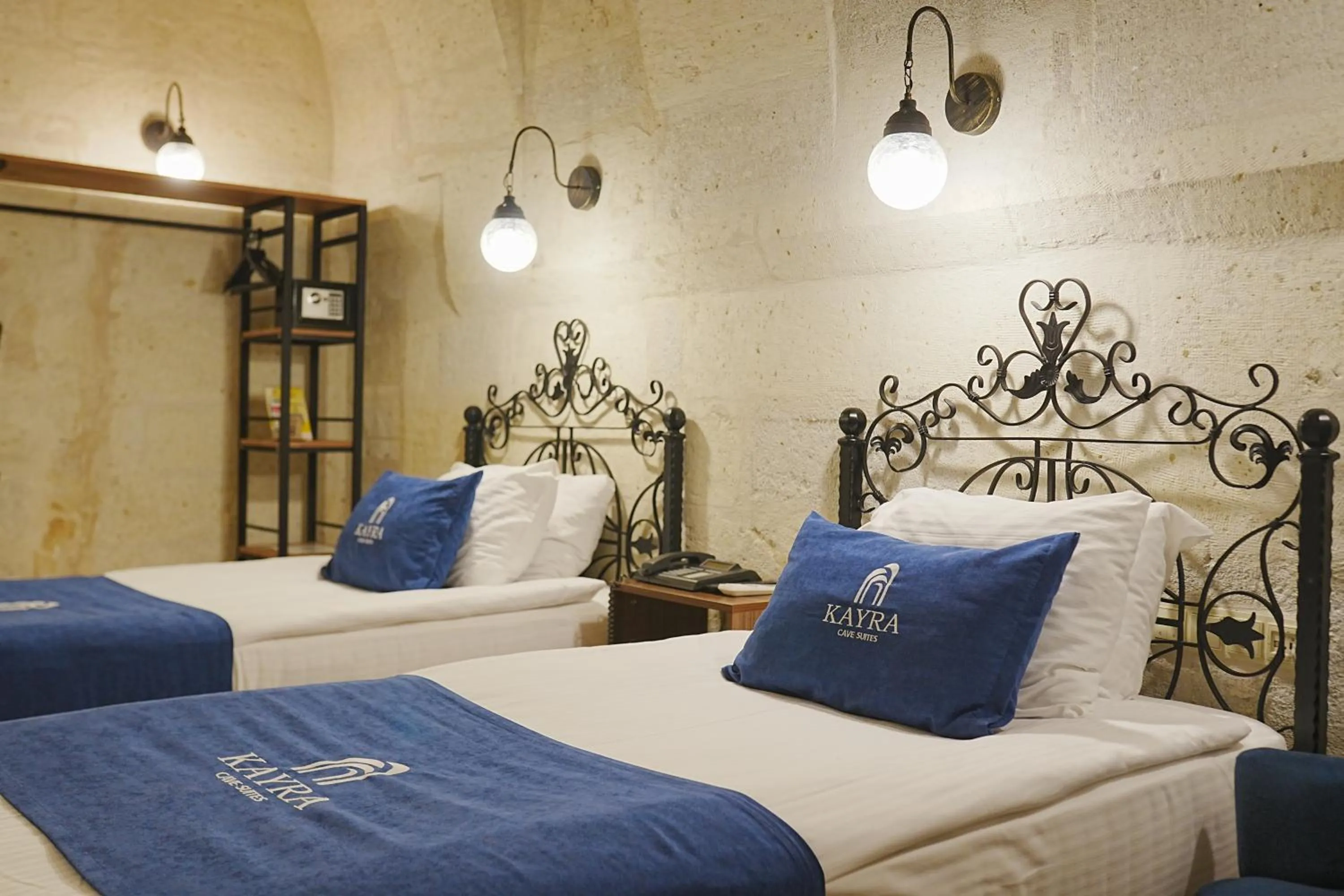 Bed in Kayra Cave Suites