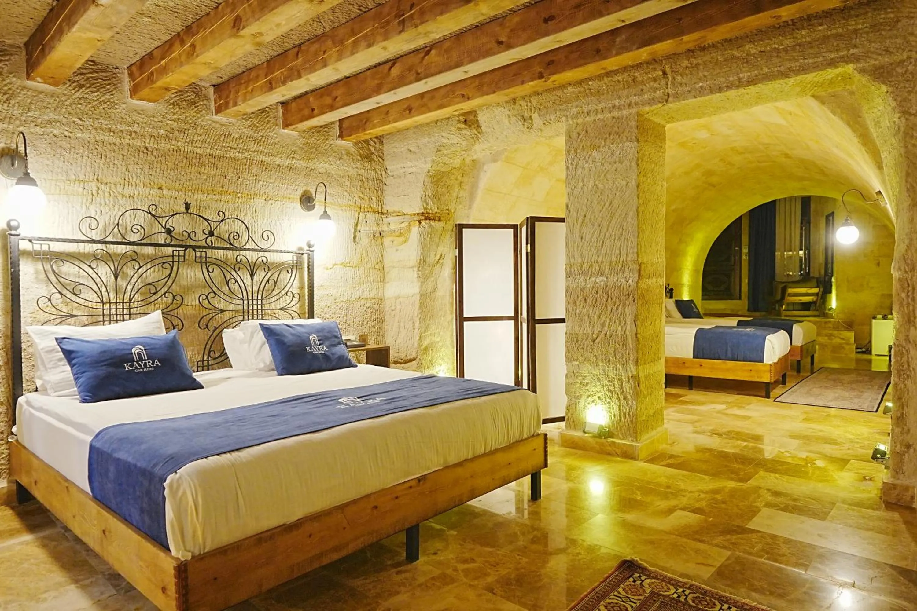 Bed in Kayra Cave Suites