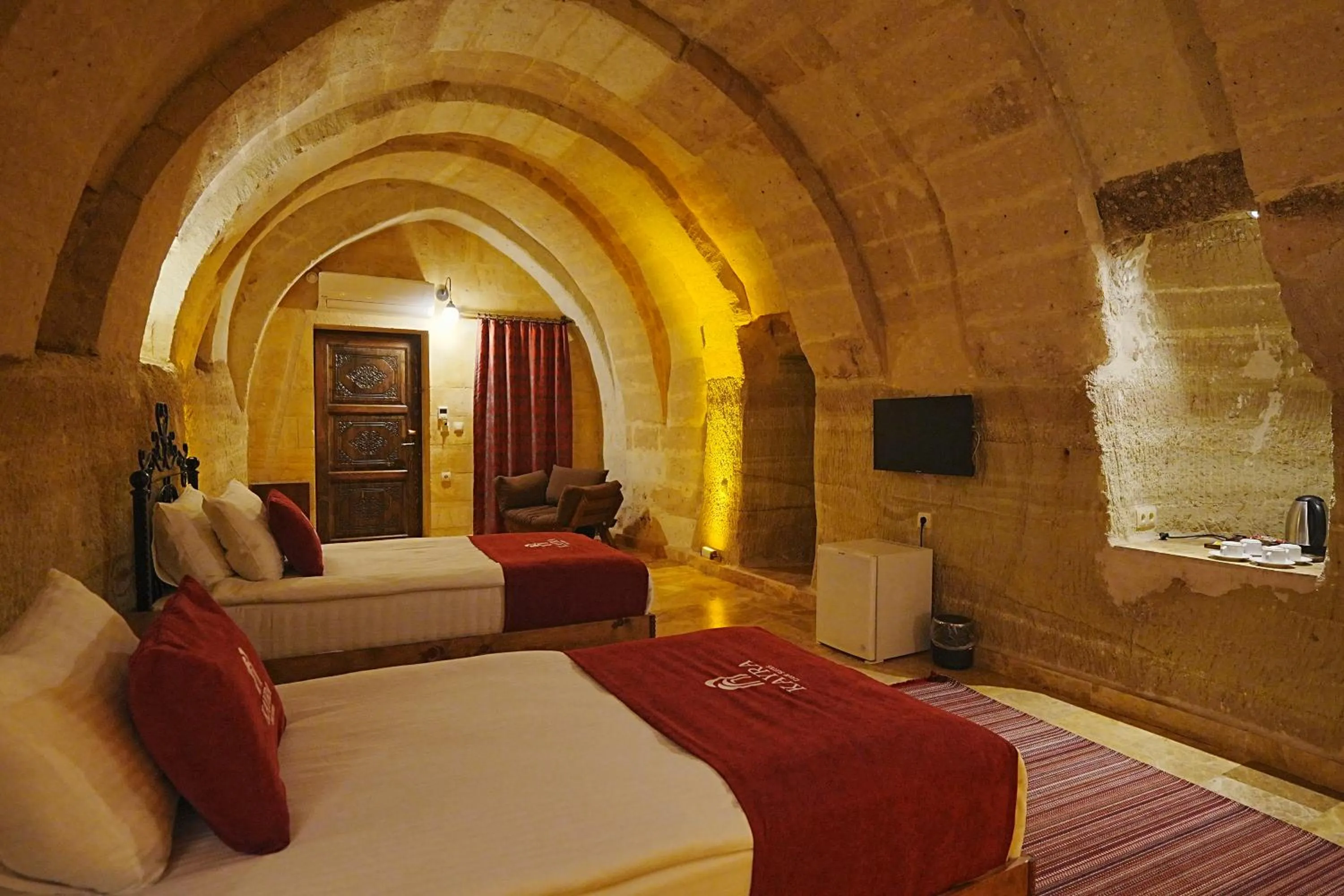 Bed in Kayra Cave Suites