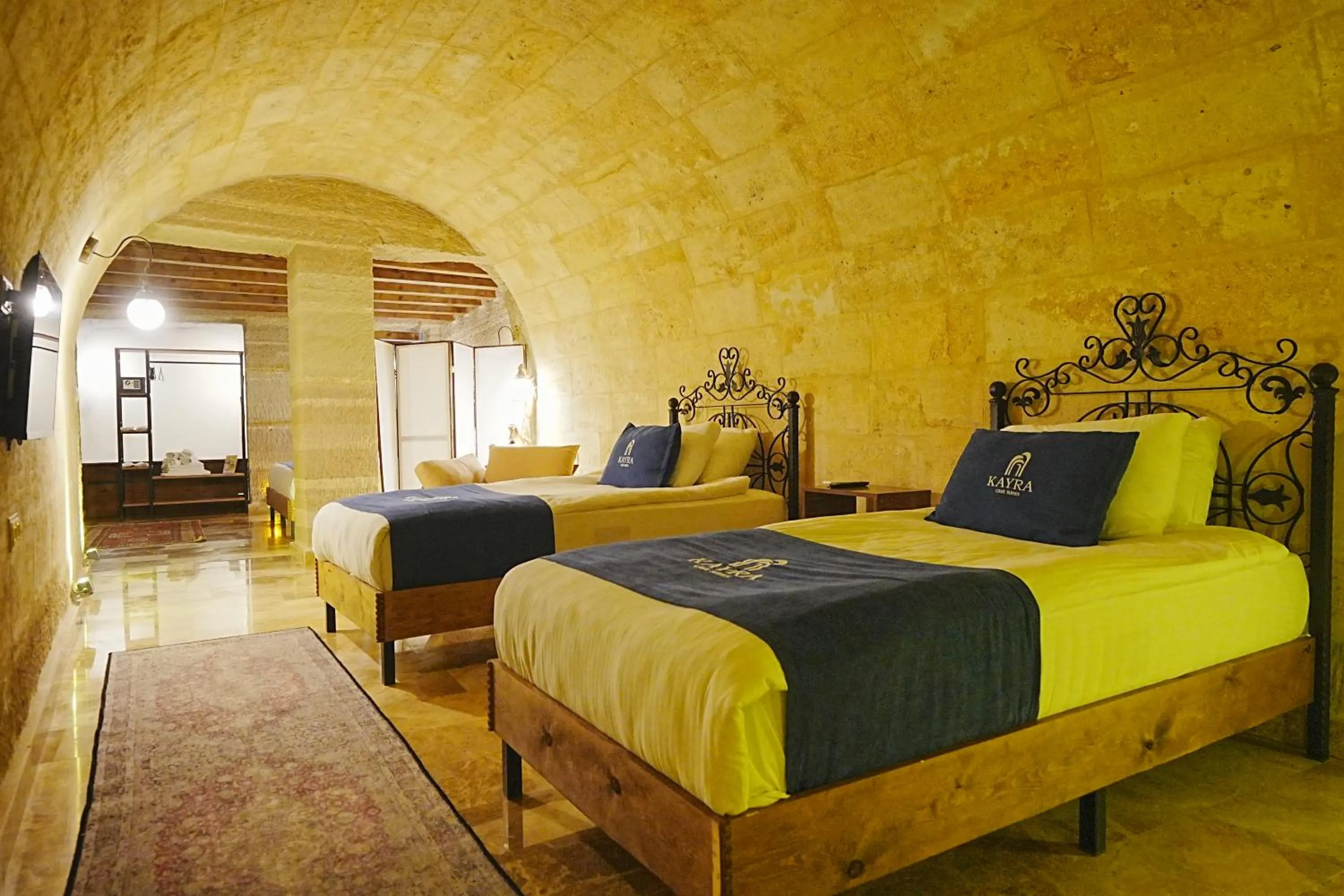 Bed in Kayra Cave Suites