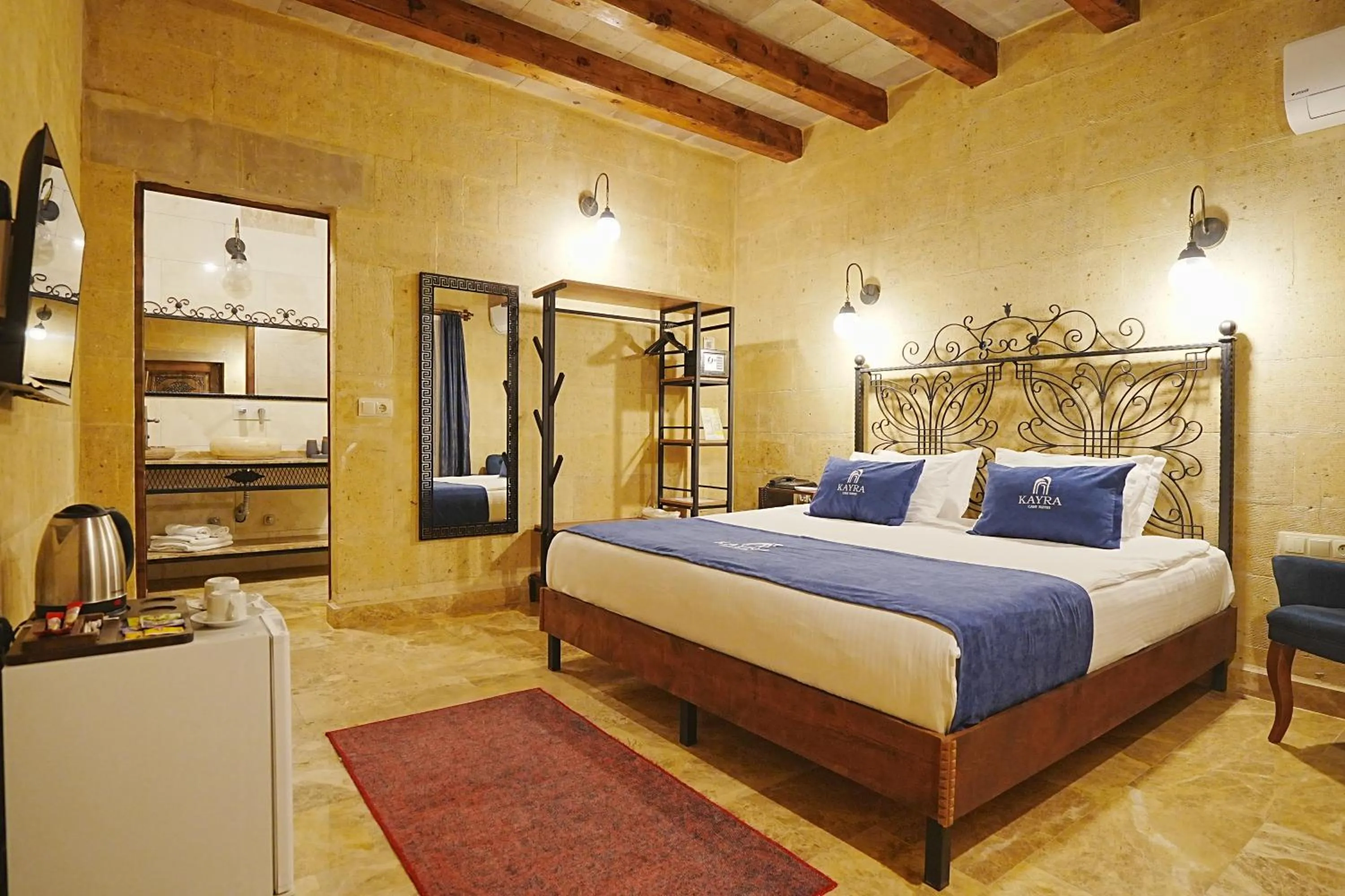 Bed in Kayra Cave Suites