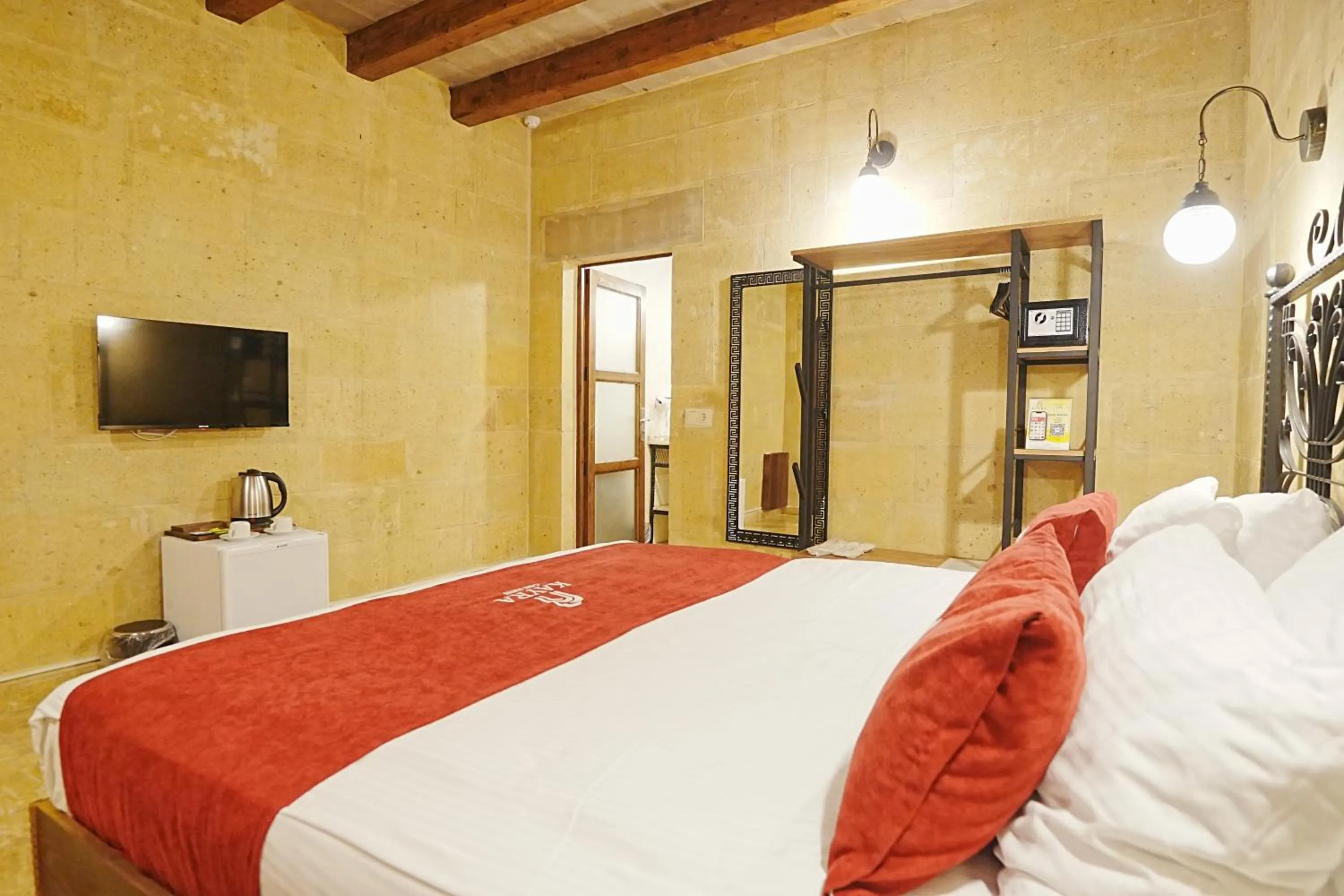 Bed in Kayra Cave Suites