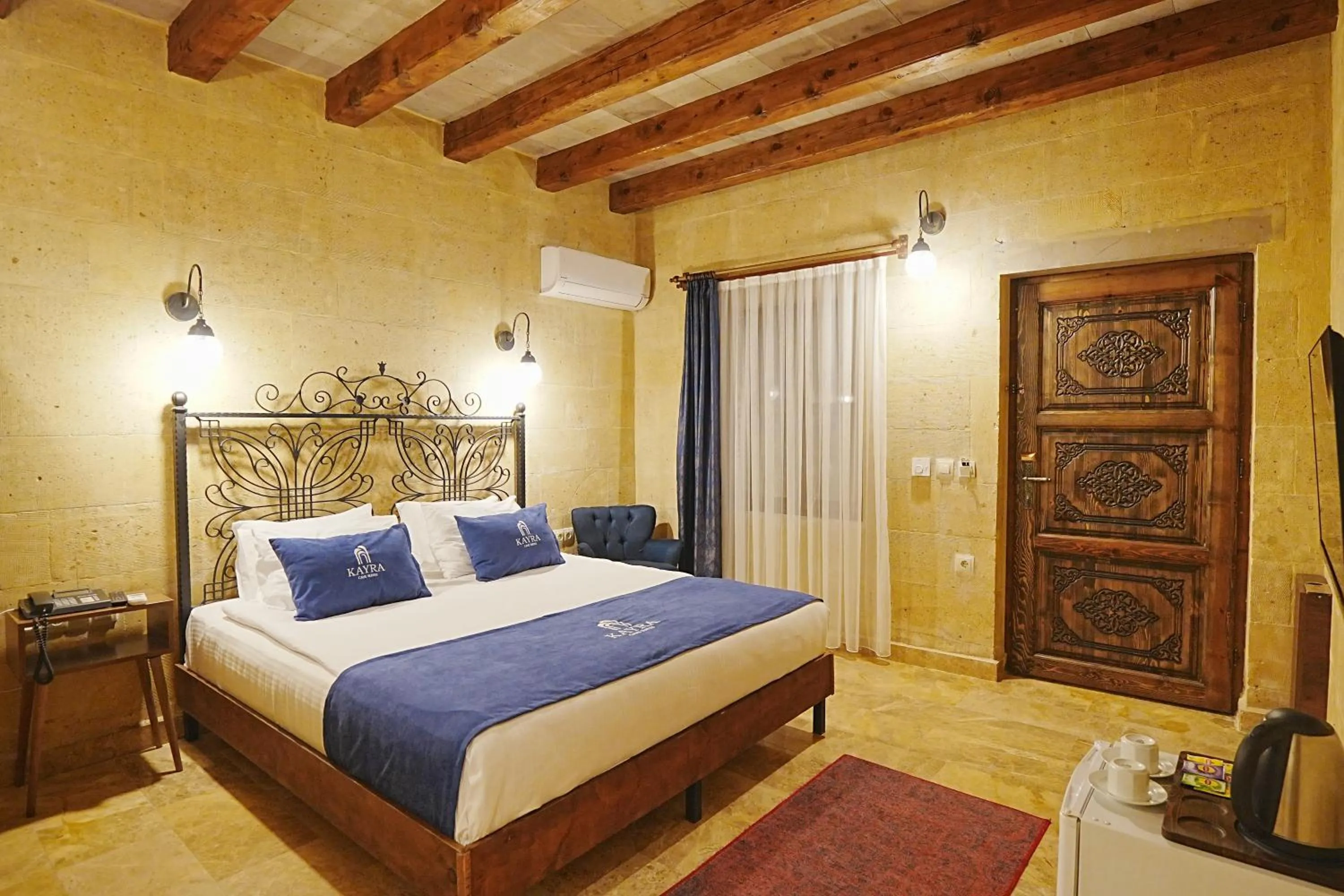 Bed in Kayra Cave Suites