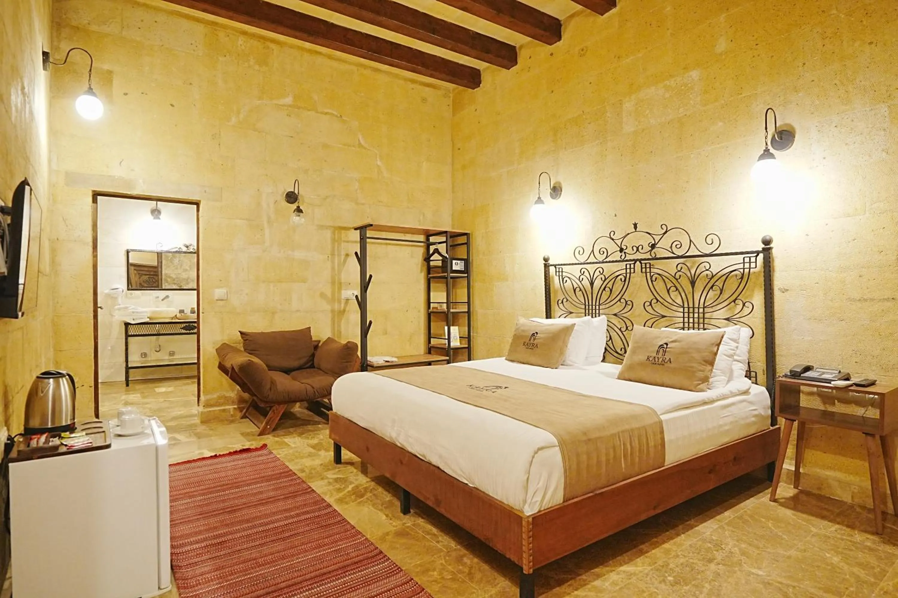 Bed in Kayra Cave Suites