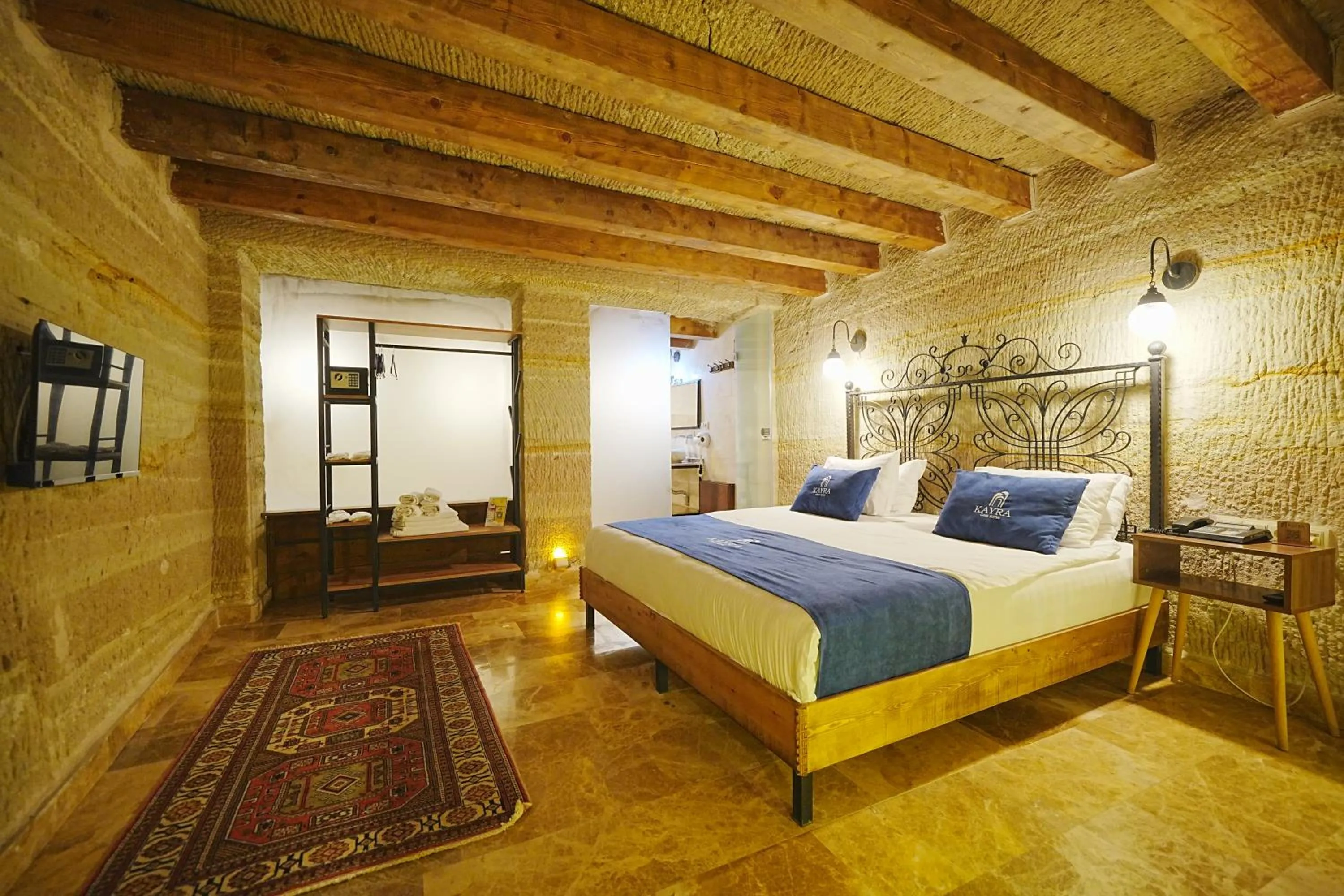 Bed in Kayra Cave Suites