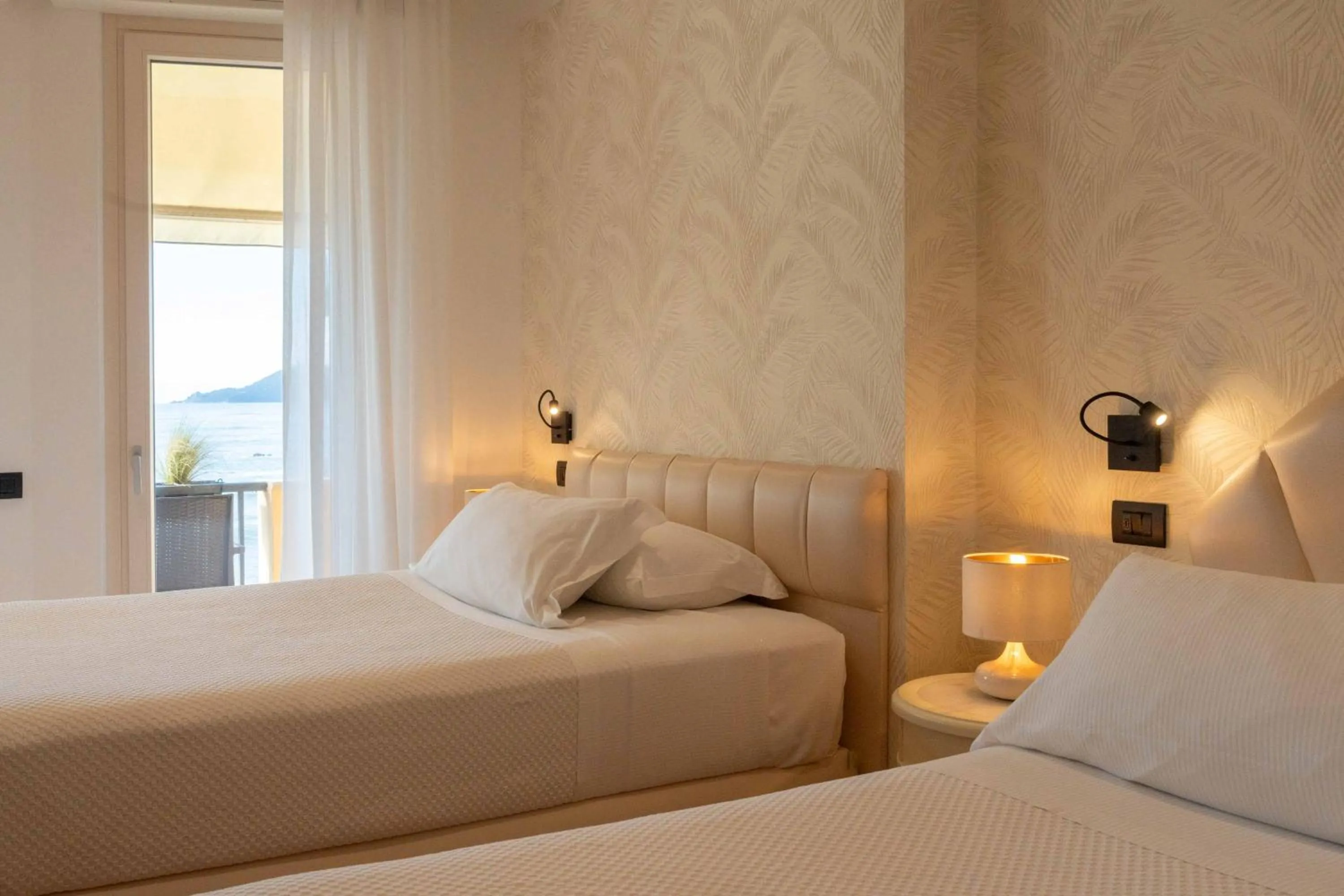 Bed in Hotel Florida Lerici