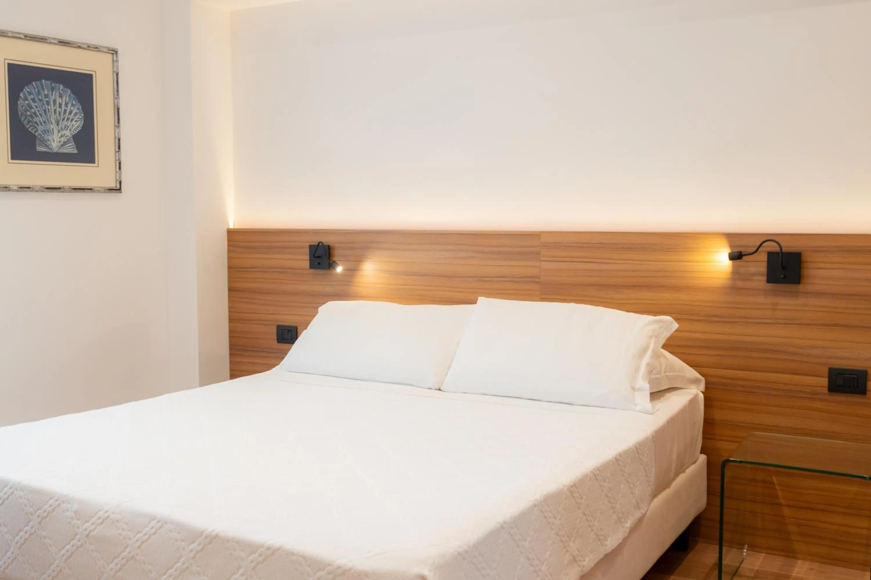 Bed in Hotel Florida Lerici