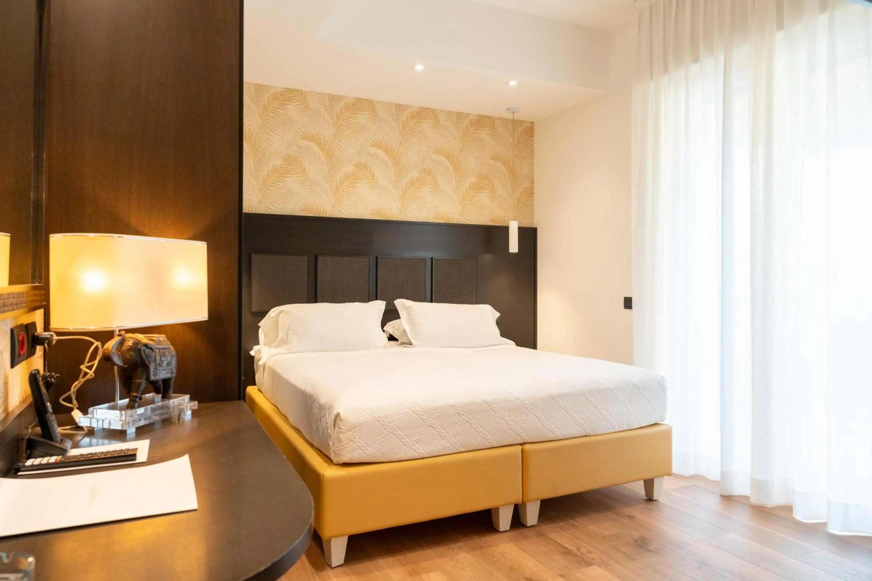 Bed in Hotel Florida Lerici