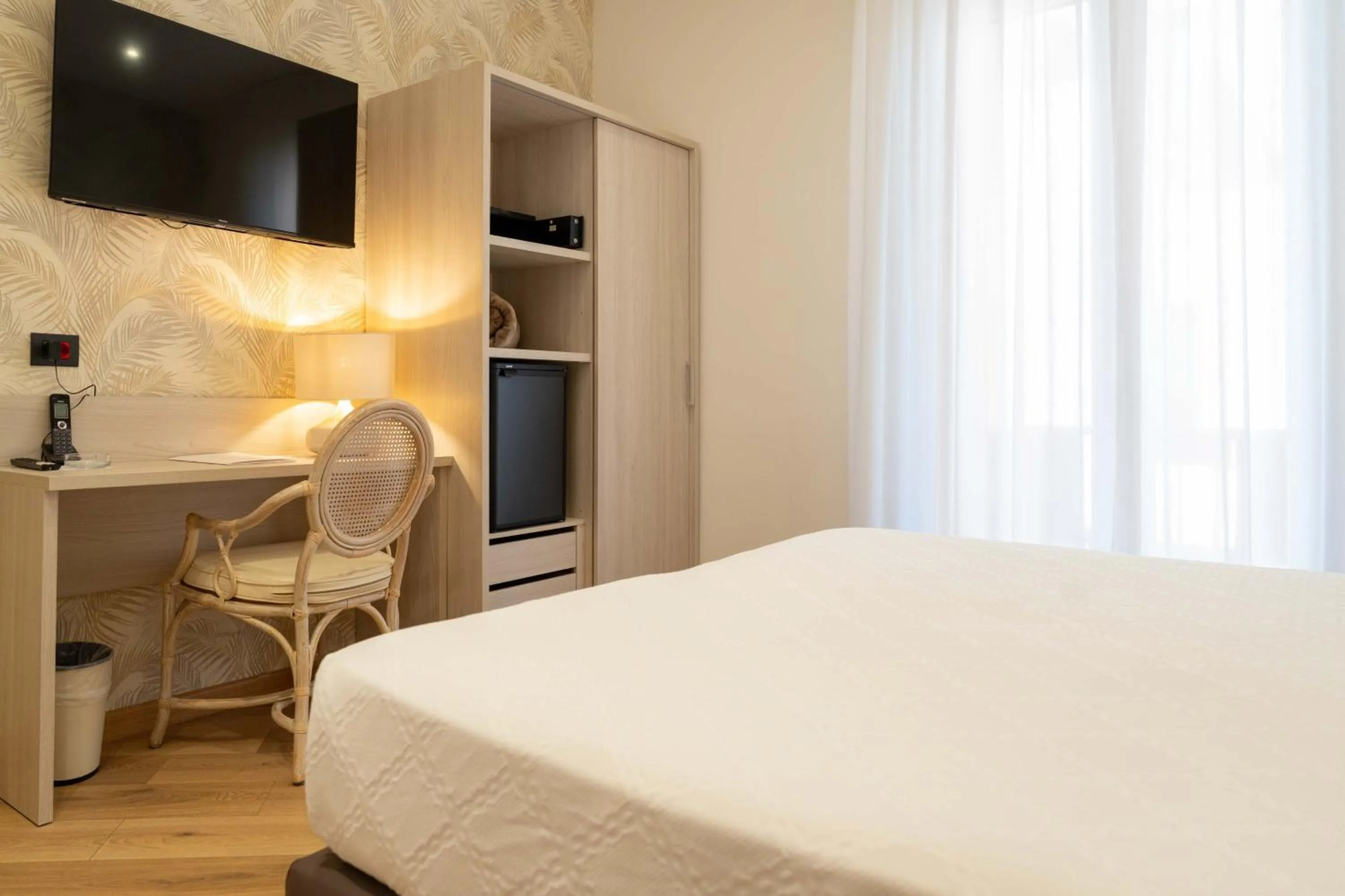 Bed in Hotel Florida Lerici