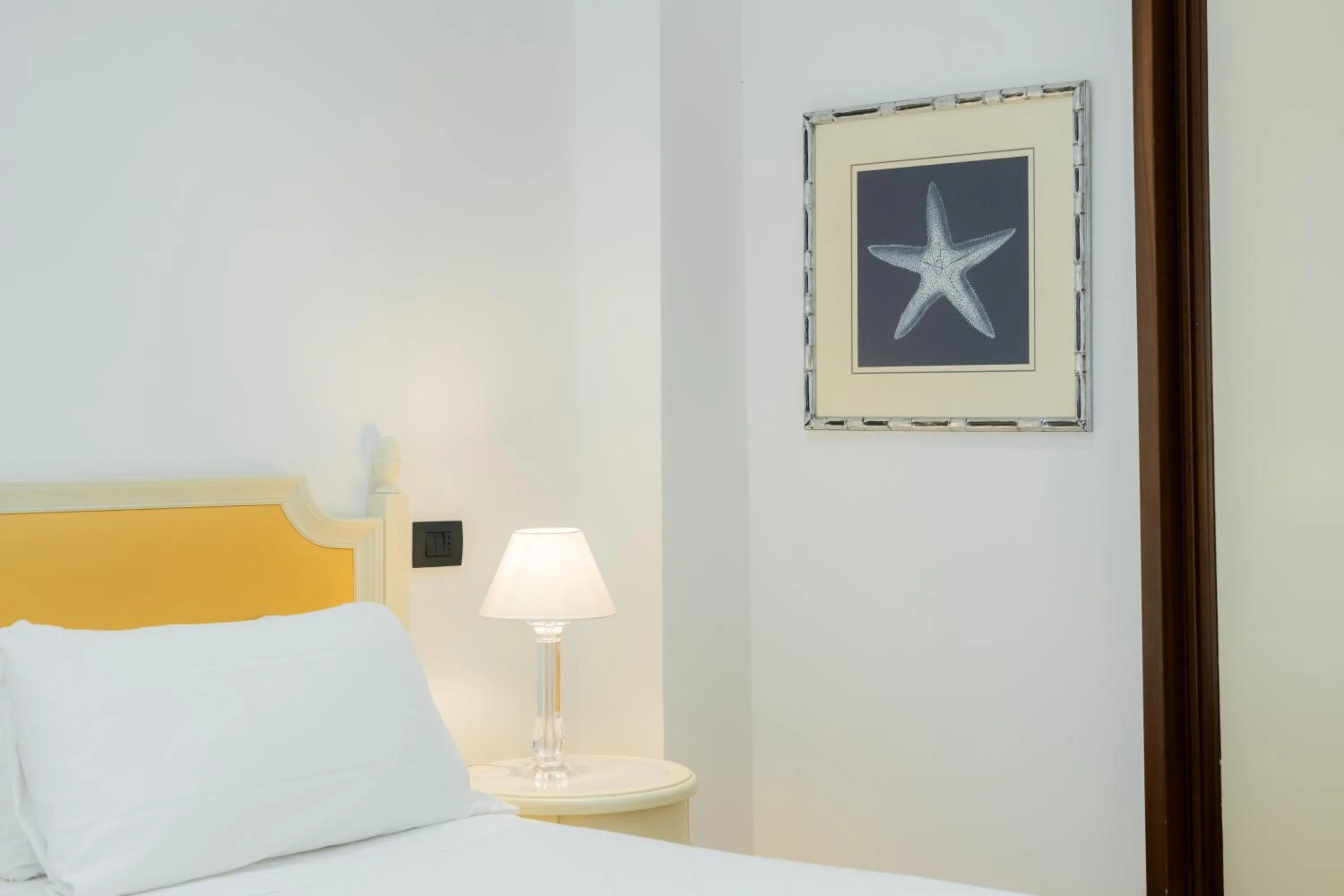 Bed in Hotel Florida Lerici