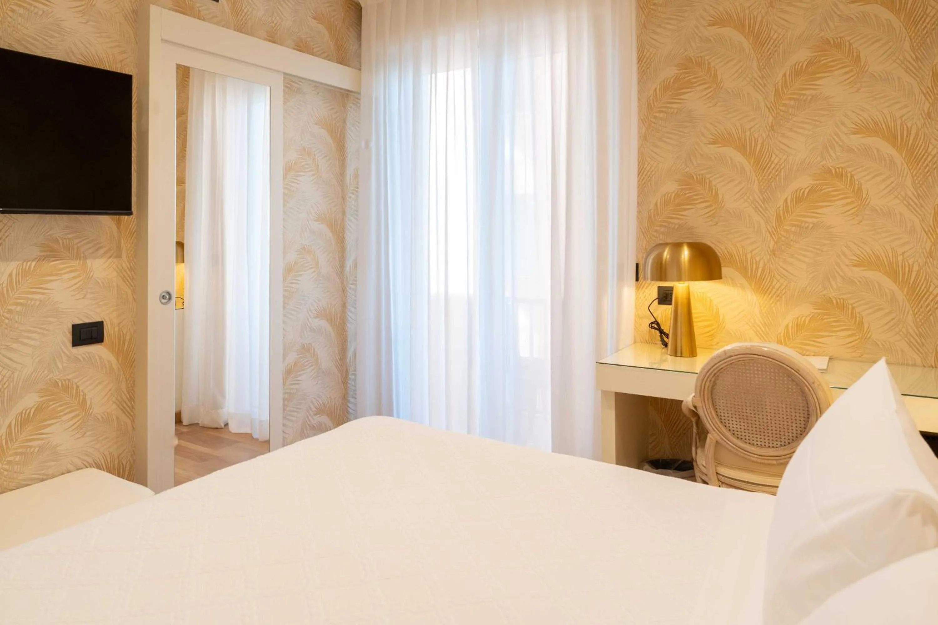 Bed in Hotel Florida Lerici