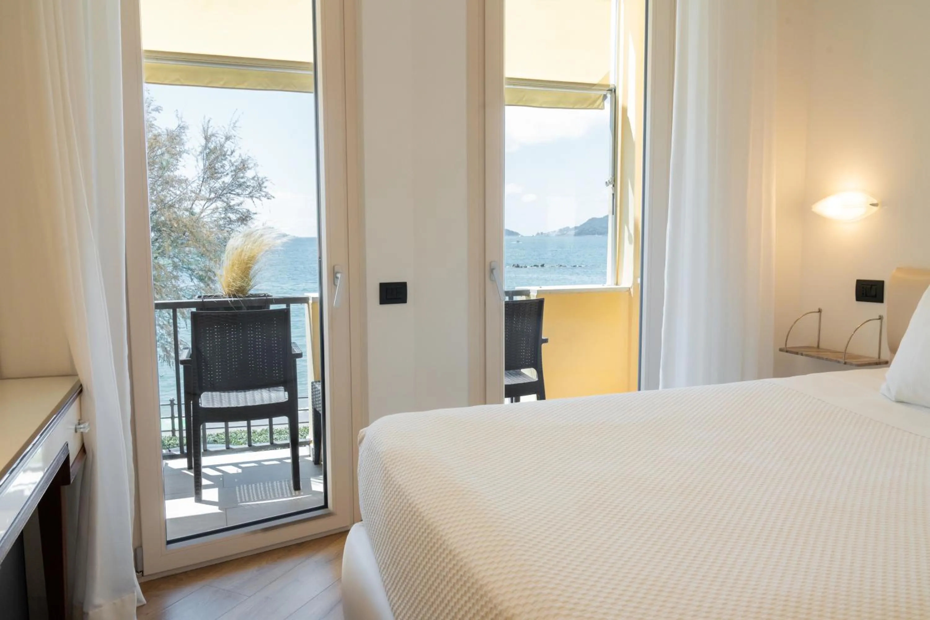 Bed in Hotel Florida Lerici