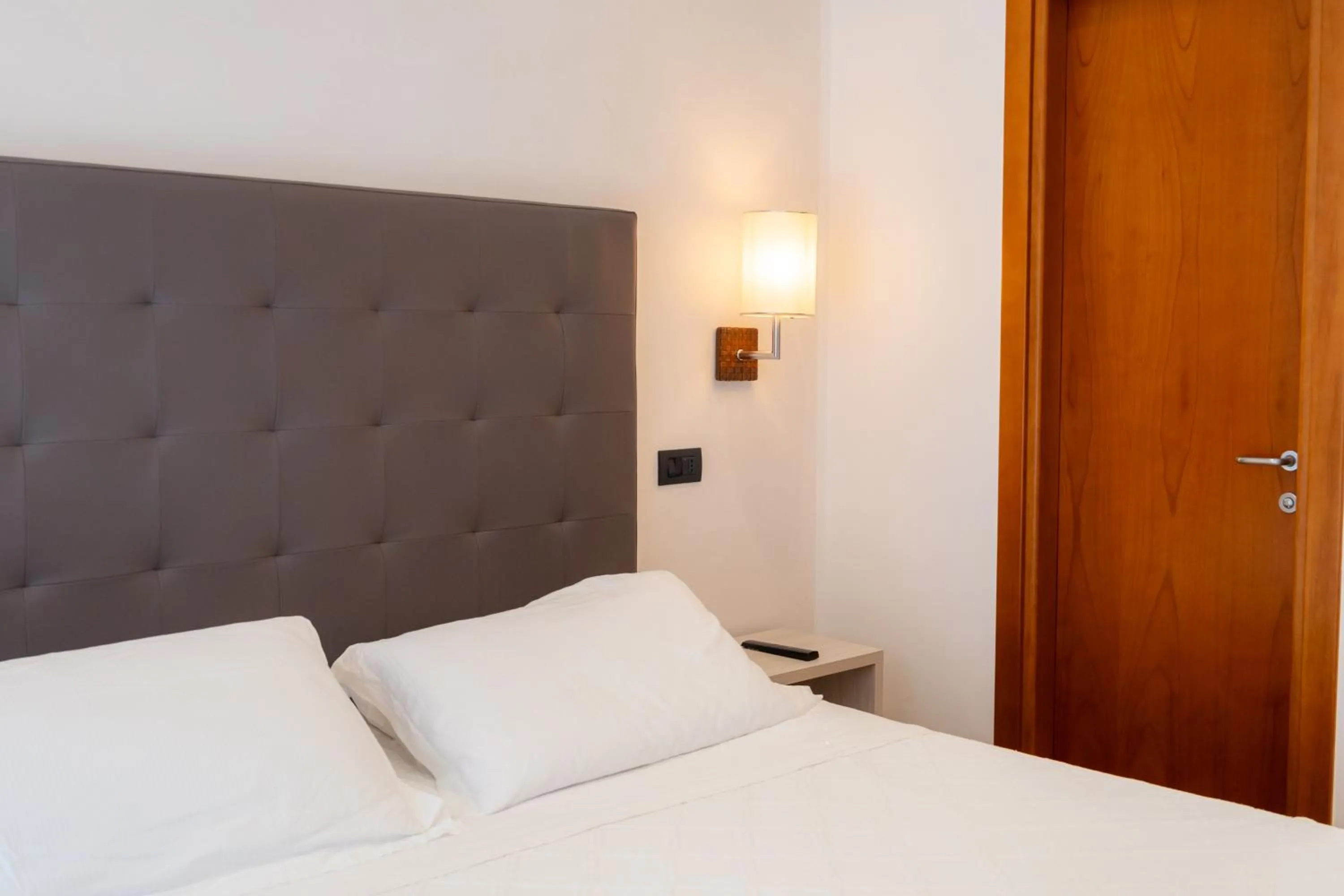 Bed in Hotel Florida Lerici