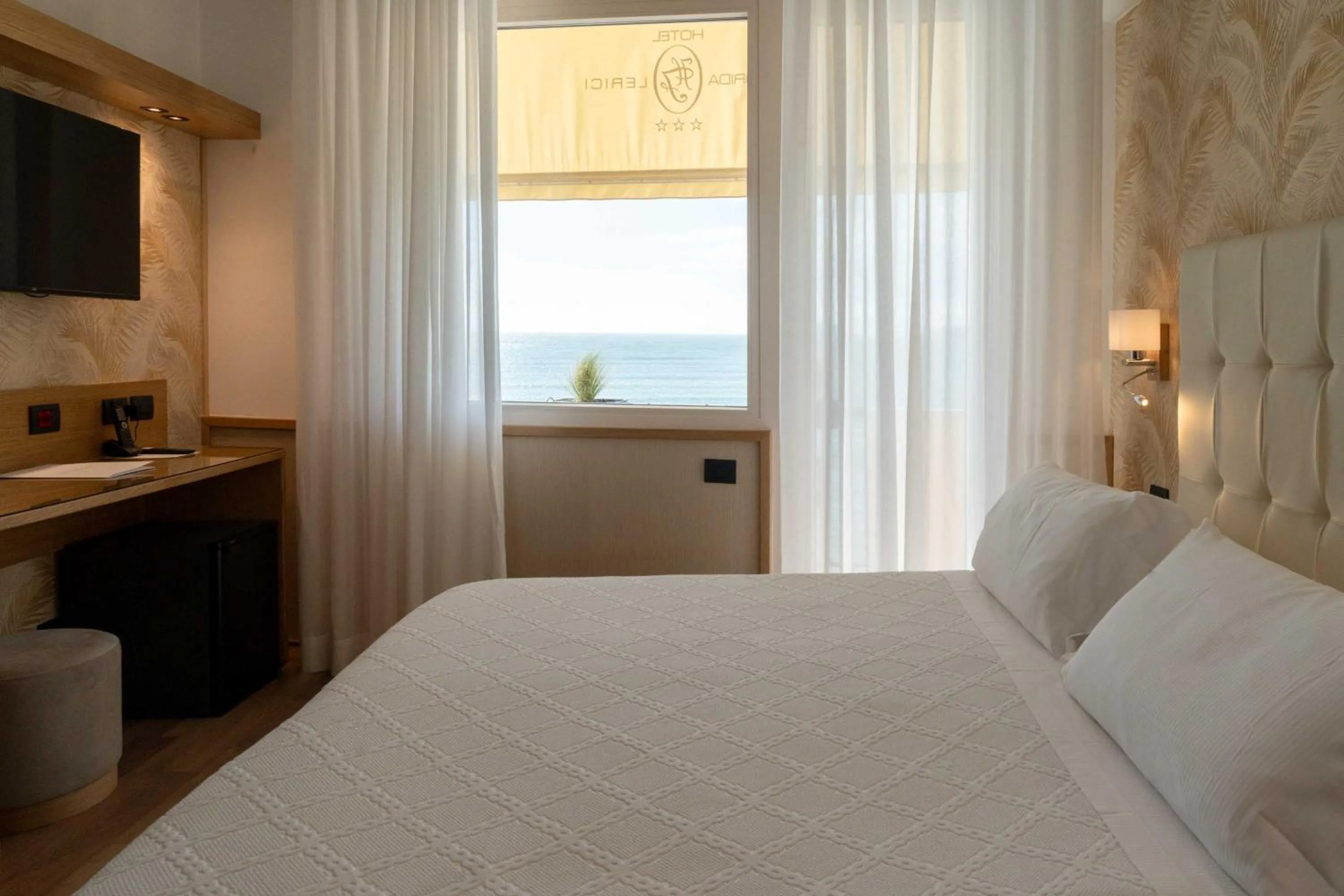 Bed in Hotel Florida Lerici
