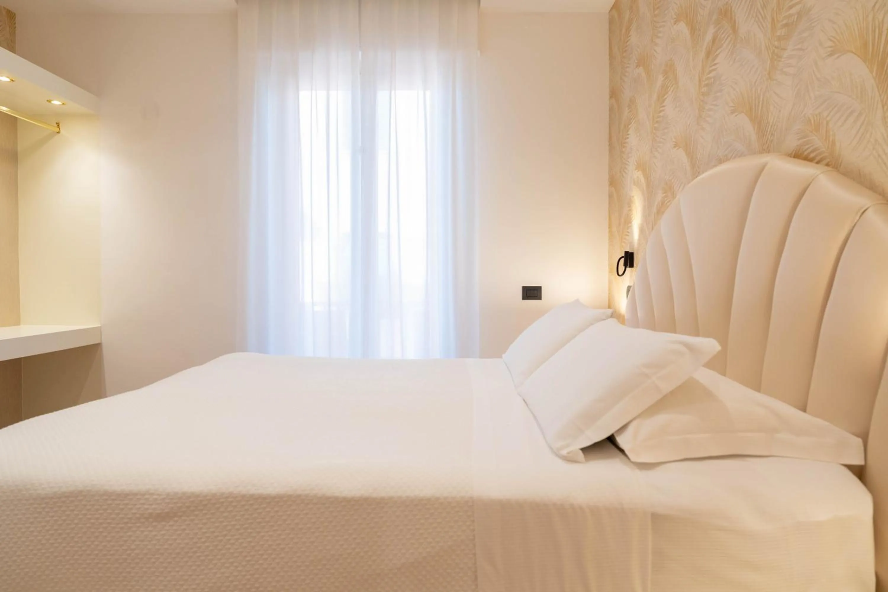 Bed in Hotel Florida Lerici