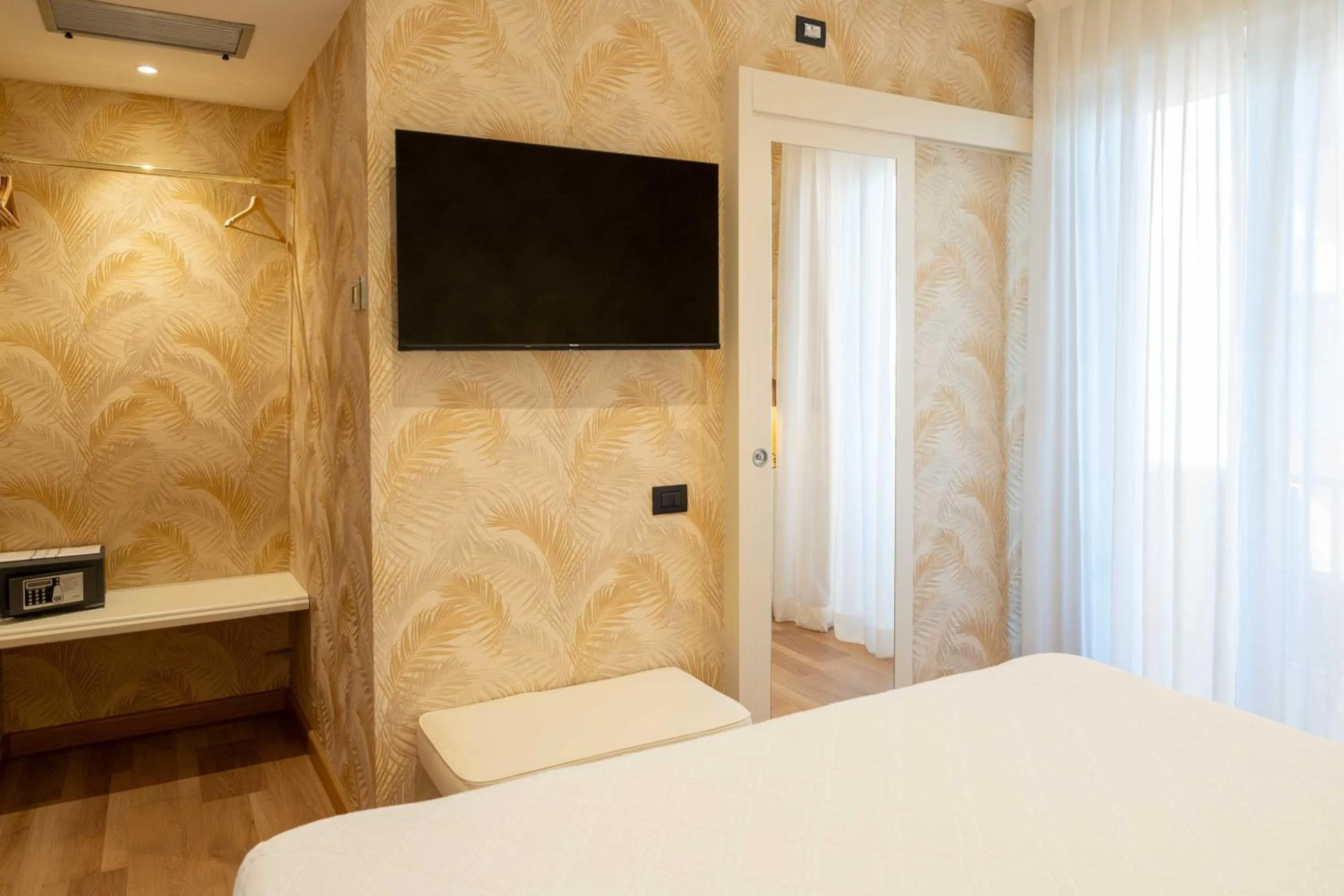 Bed in Hotel Florida Lerici