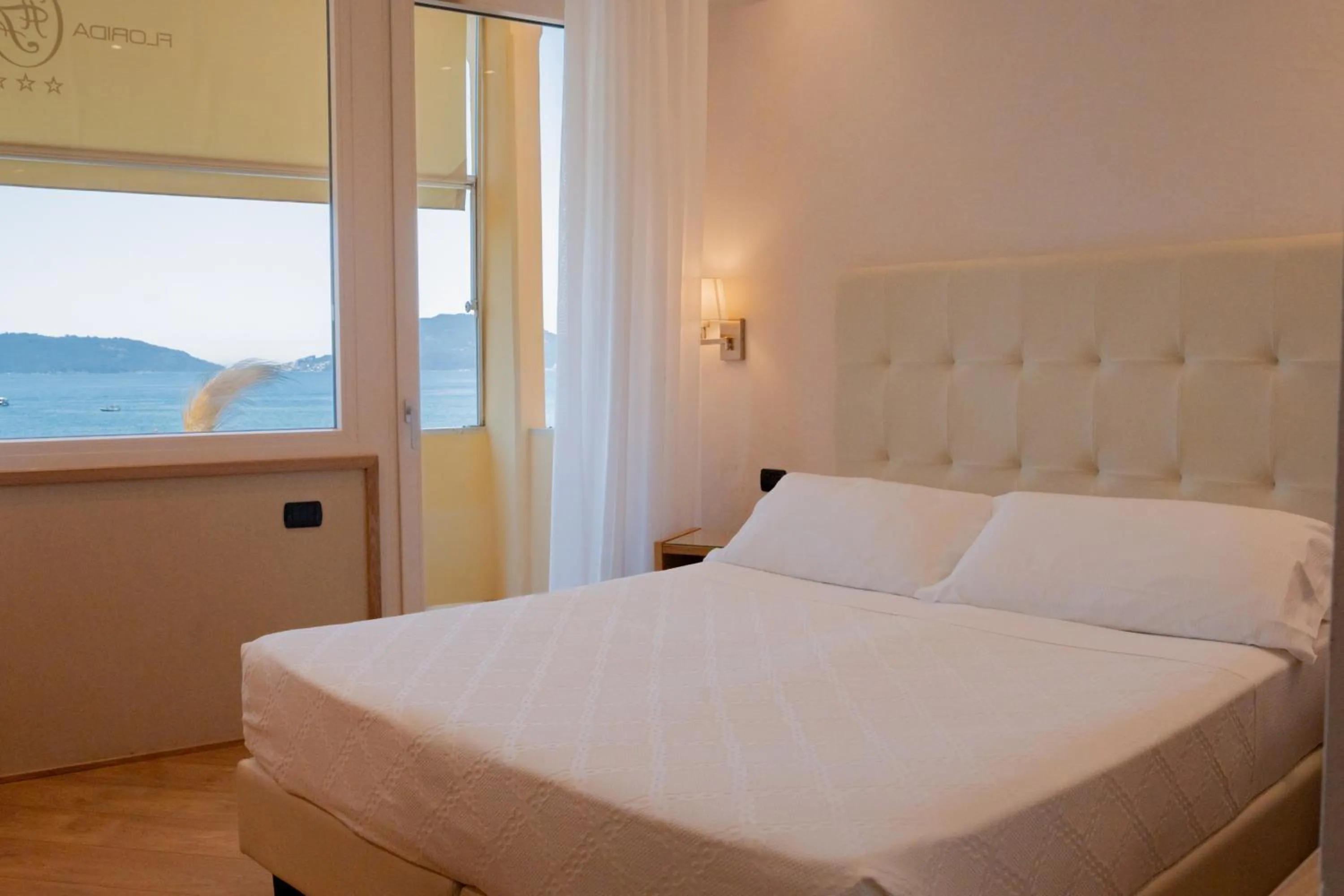 Bed in Hotel Florida Lerici