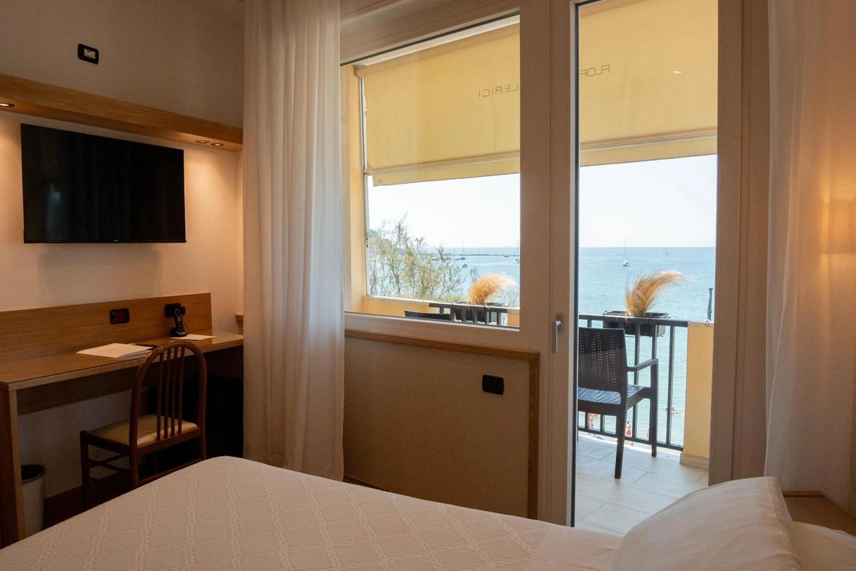 Bed in Hotel Florida Lerici