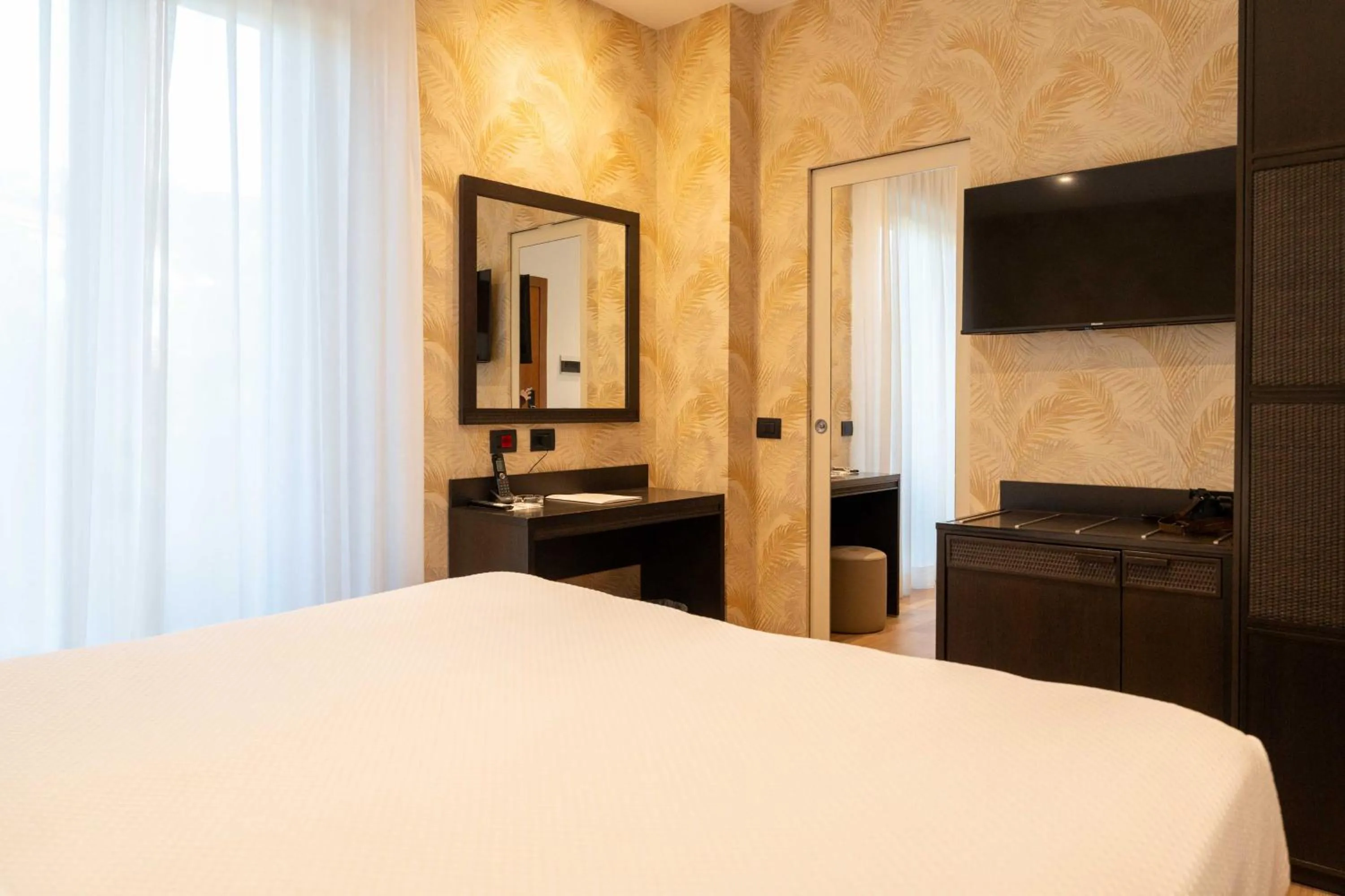 Bed in Hotel Florida Lerici