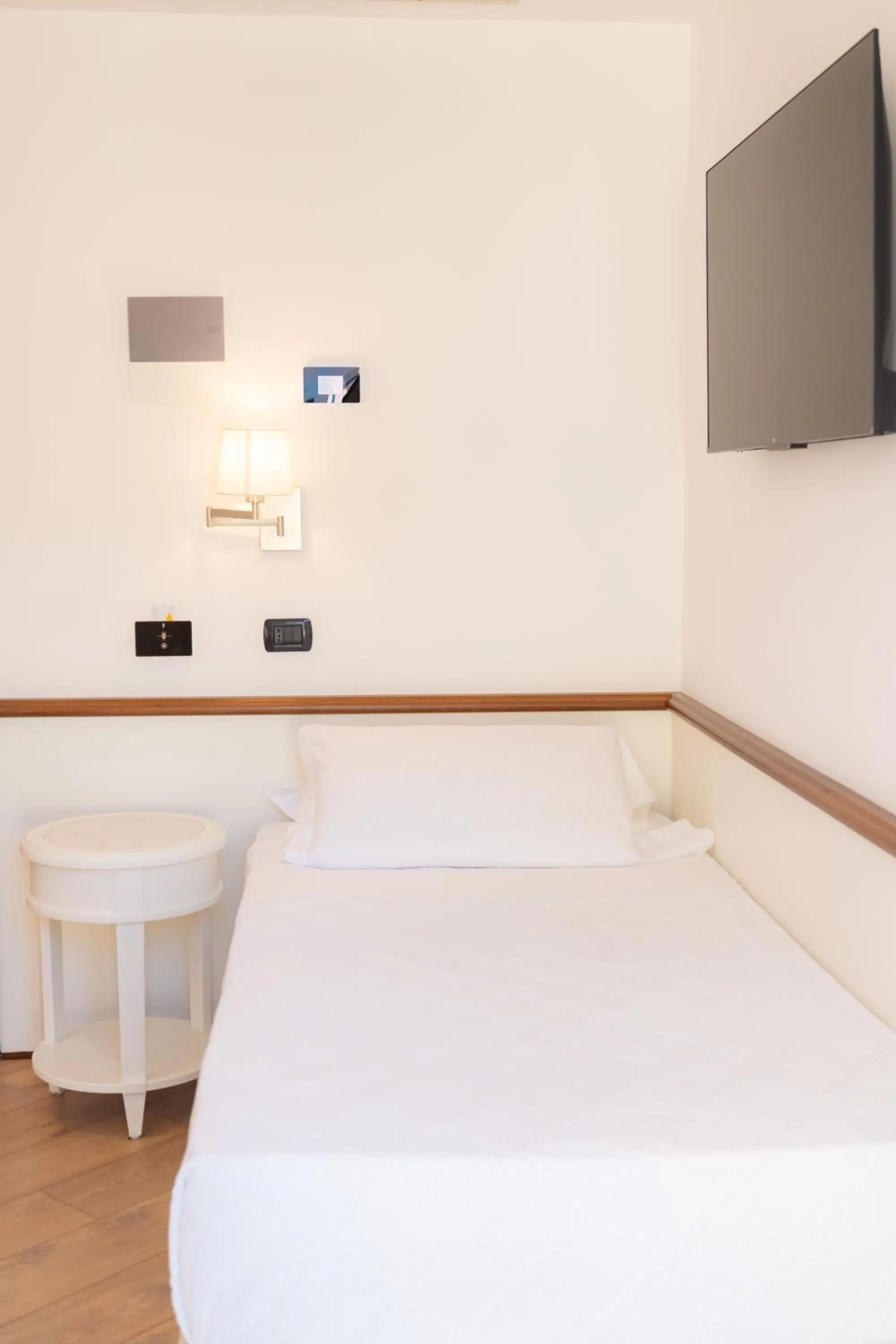 Bed in Hotel Florida Lerici