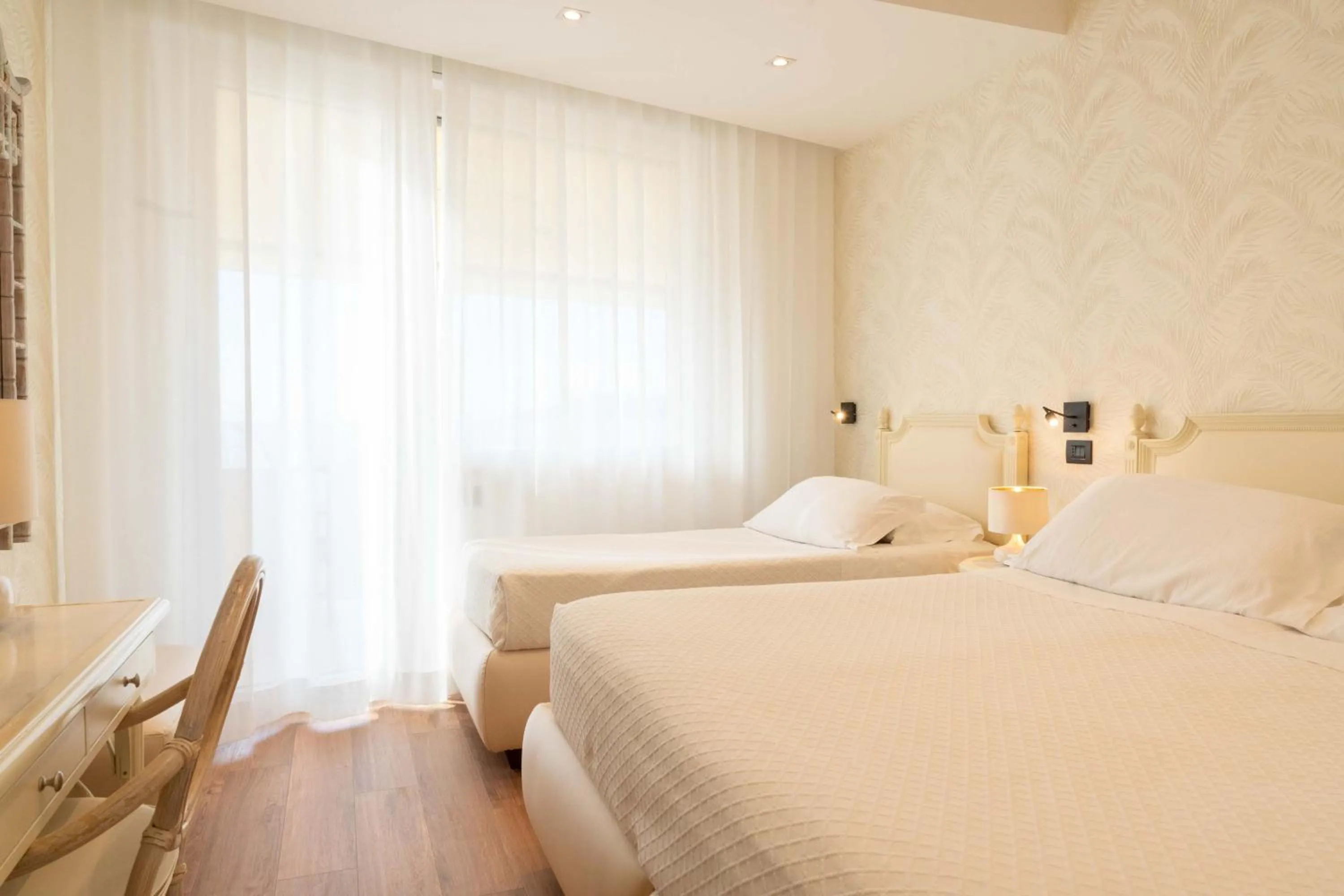 Bed in Hotel Florida Lerici