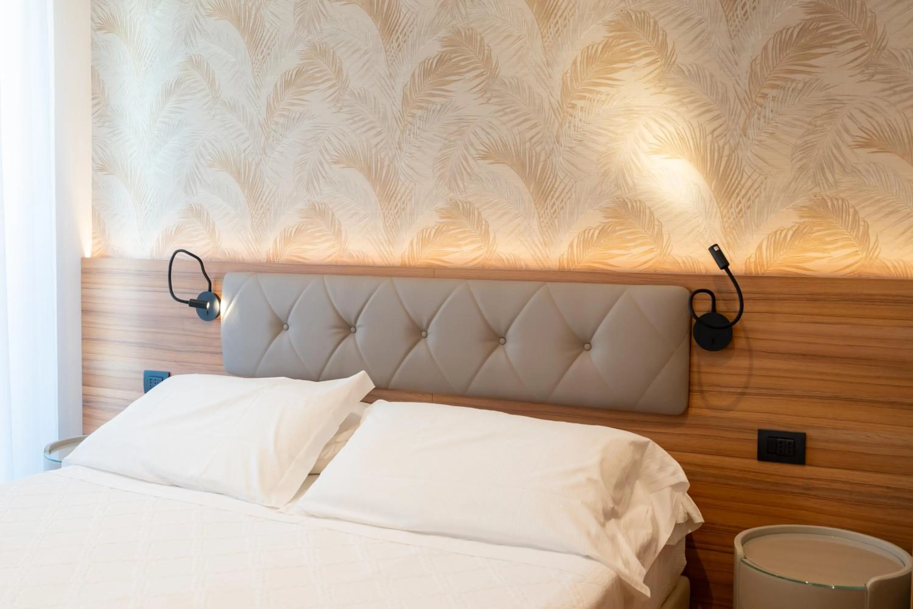 Bed in Hotel Florida Lerici