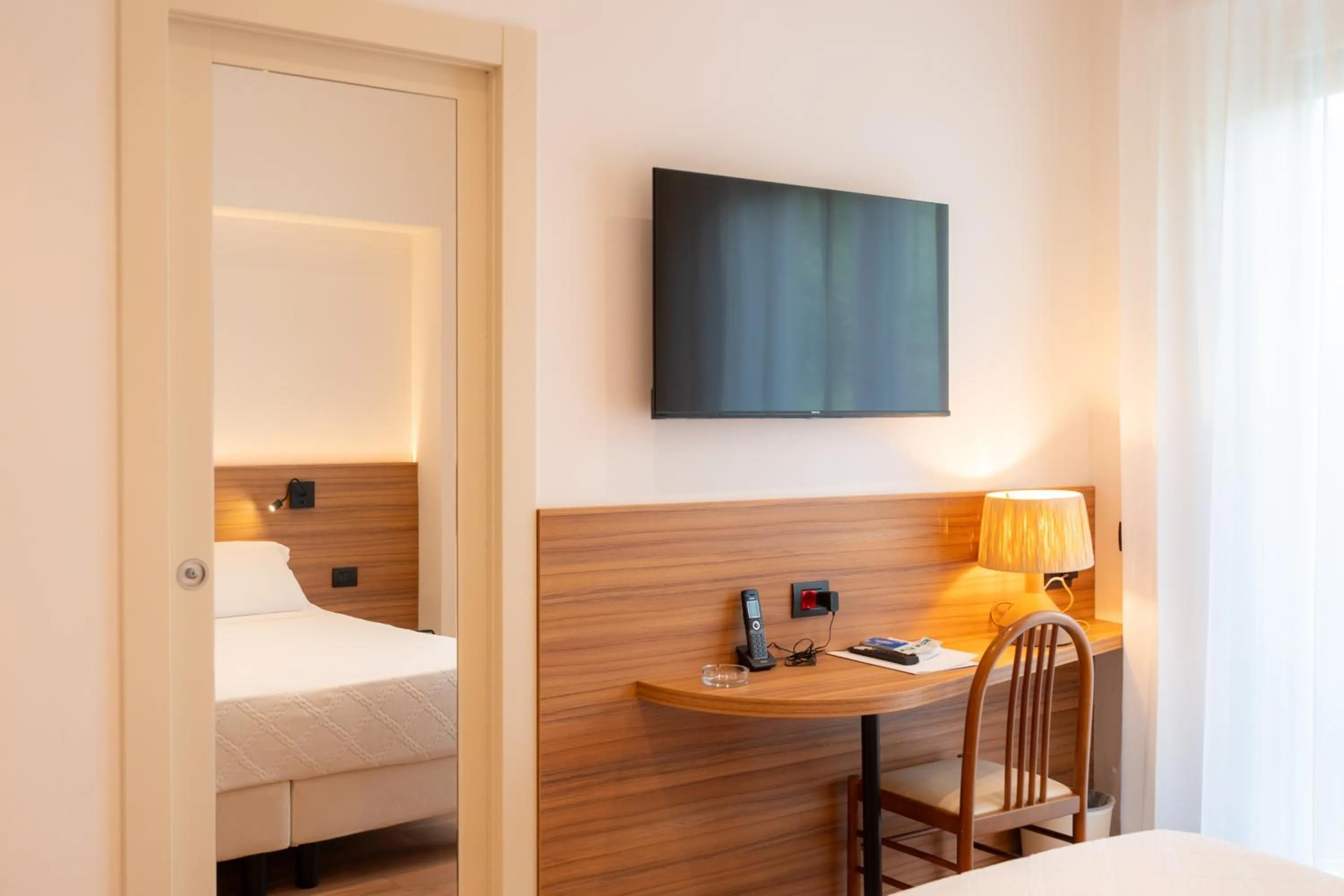 Bed in Hotel Florida Lerici