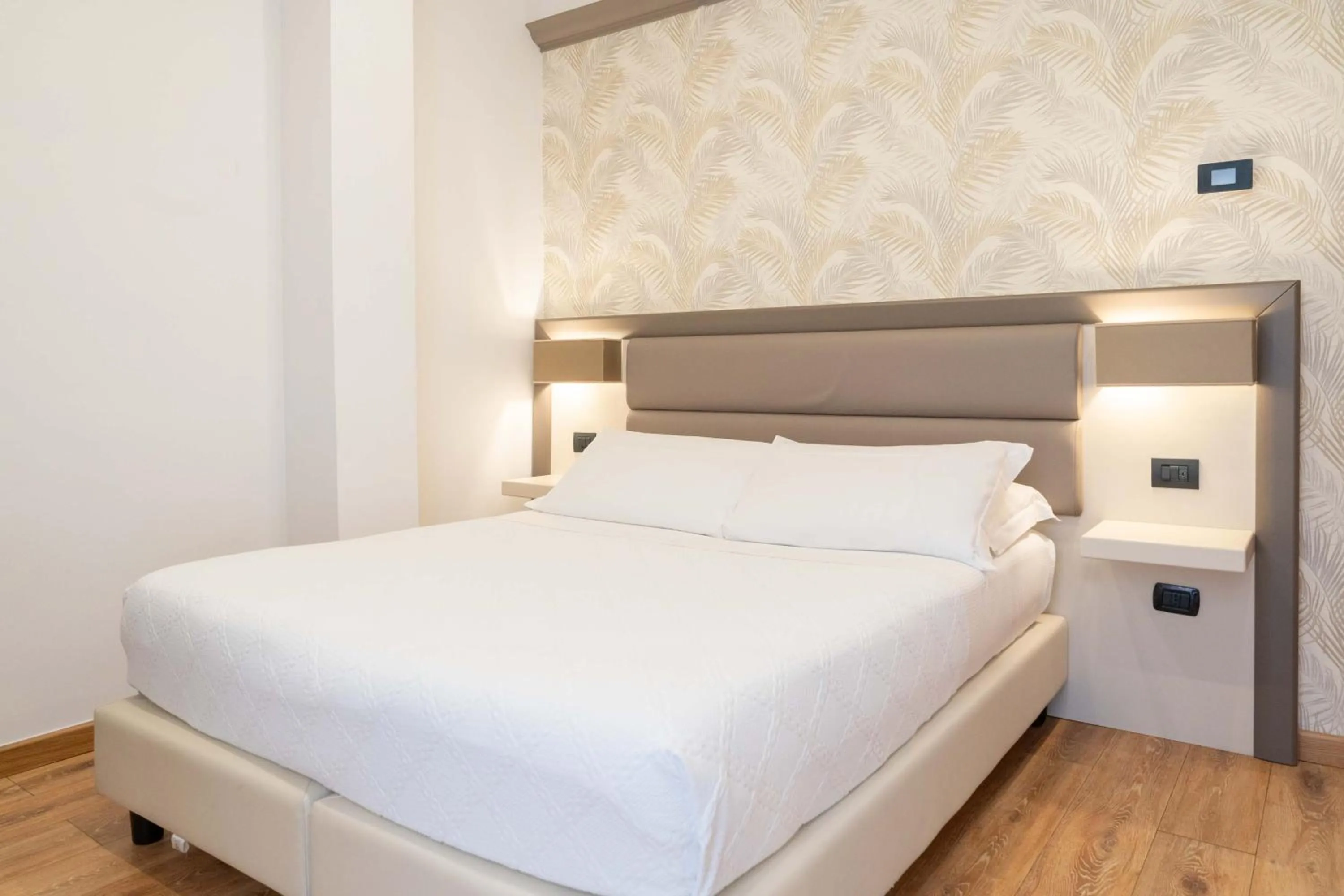 Bed in Hotel Florida Lerici