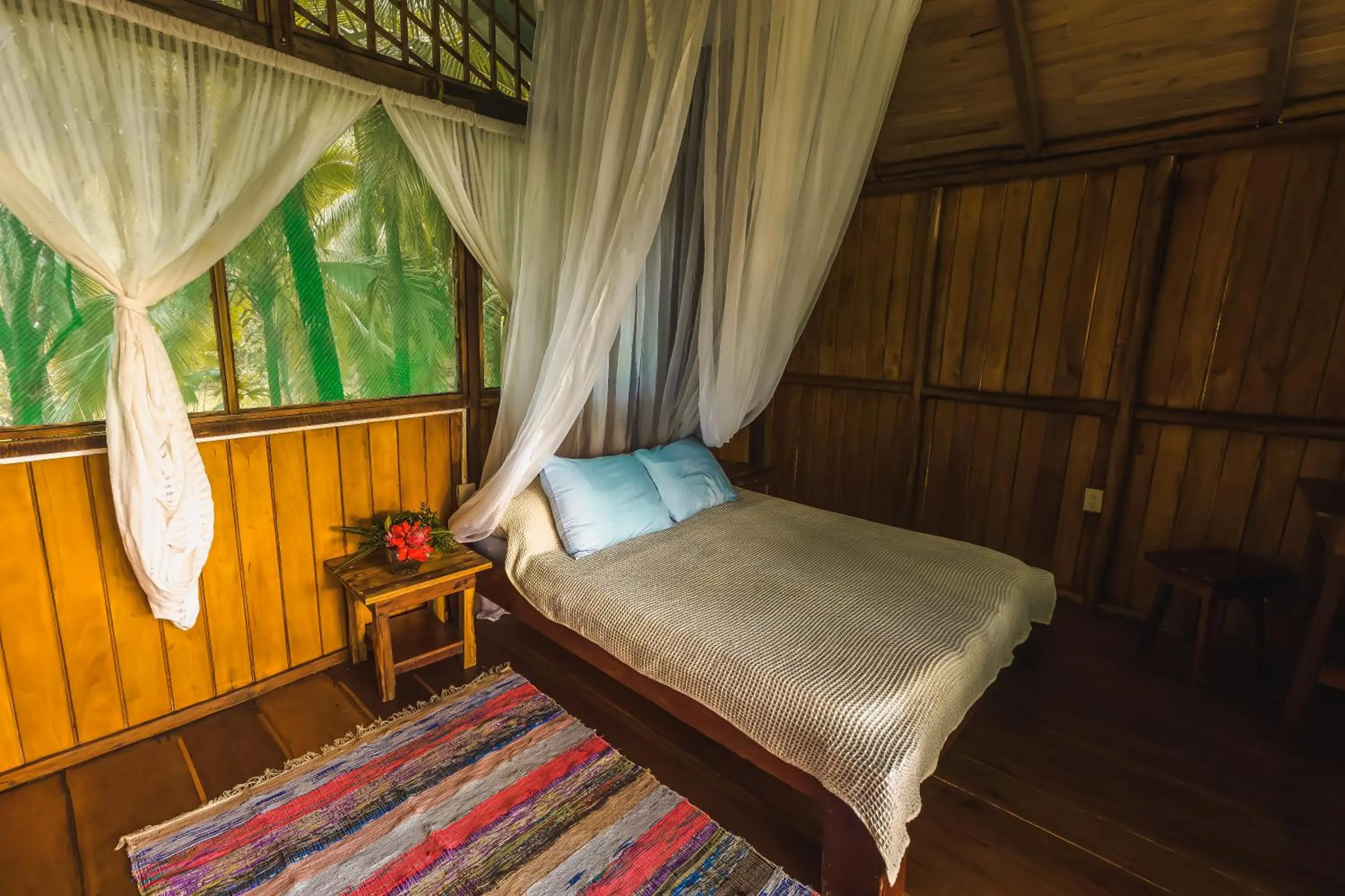 Bed in Ocean Forest Ecolodge