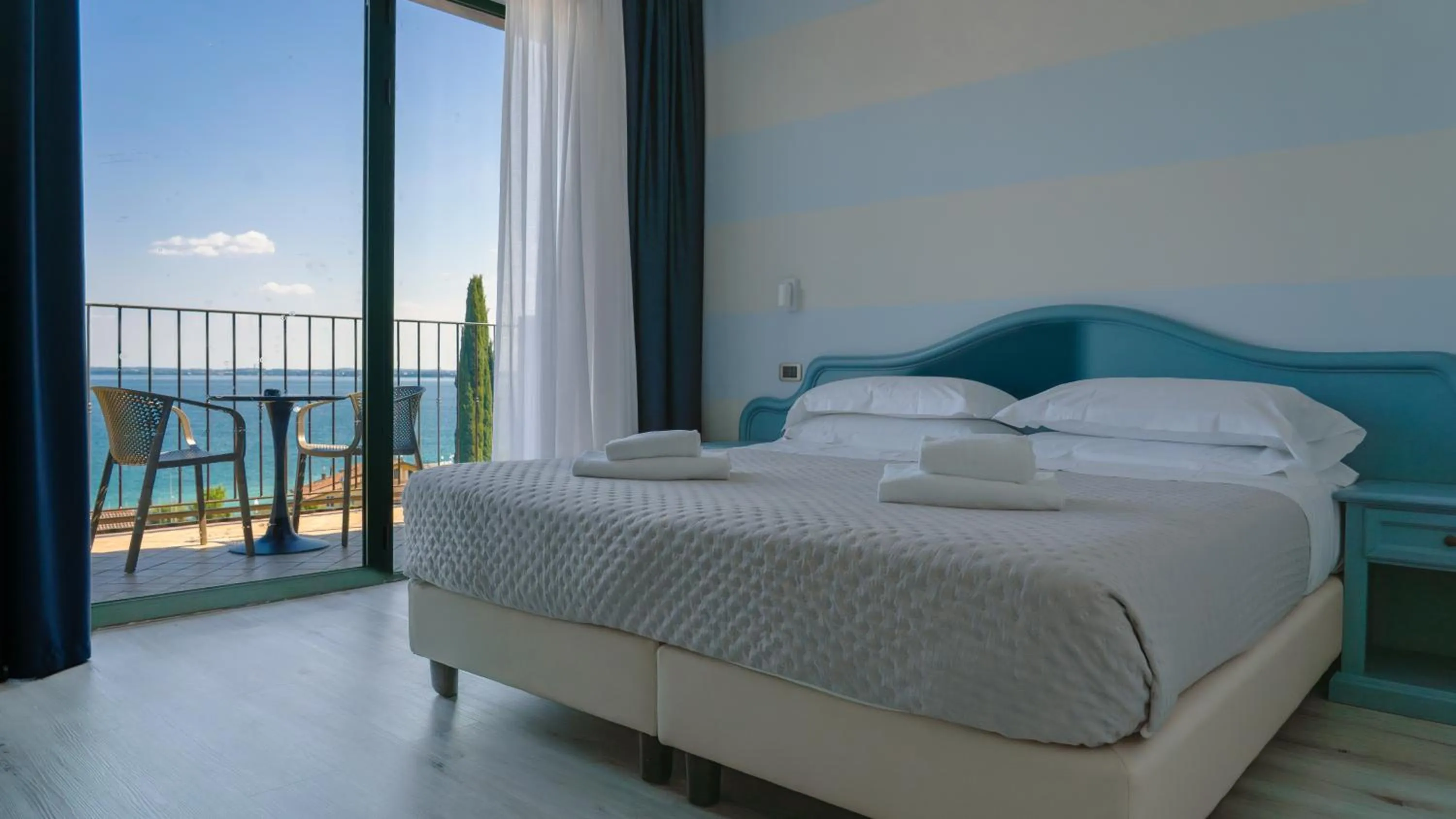 View (from property/room), Bed in AHG Riva Del Sole Hotel - Adults Only