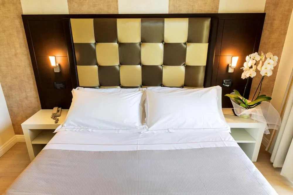 Bed in JR Resort Logos Forte dei Marmi