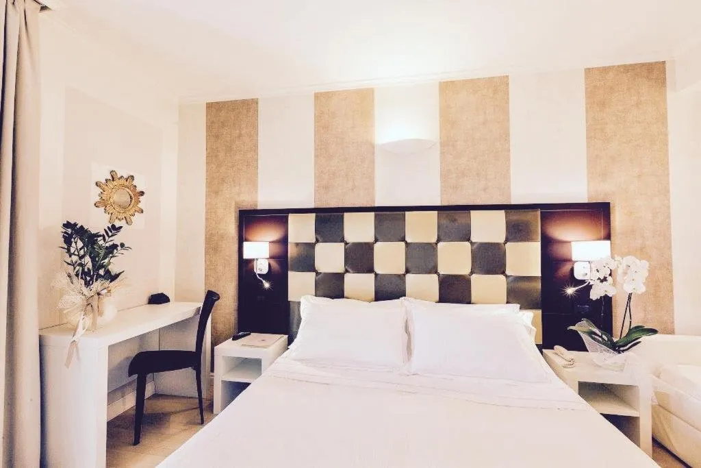 Bed in JR Resort Logos Forte dei Marmi