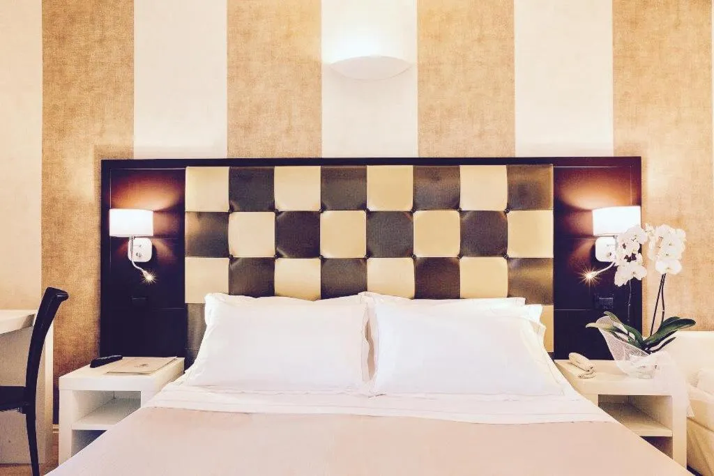 Bed in JR Resort Logos Forte dei Marmi