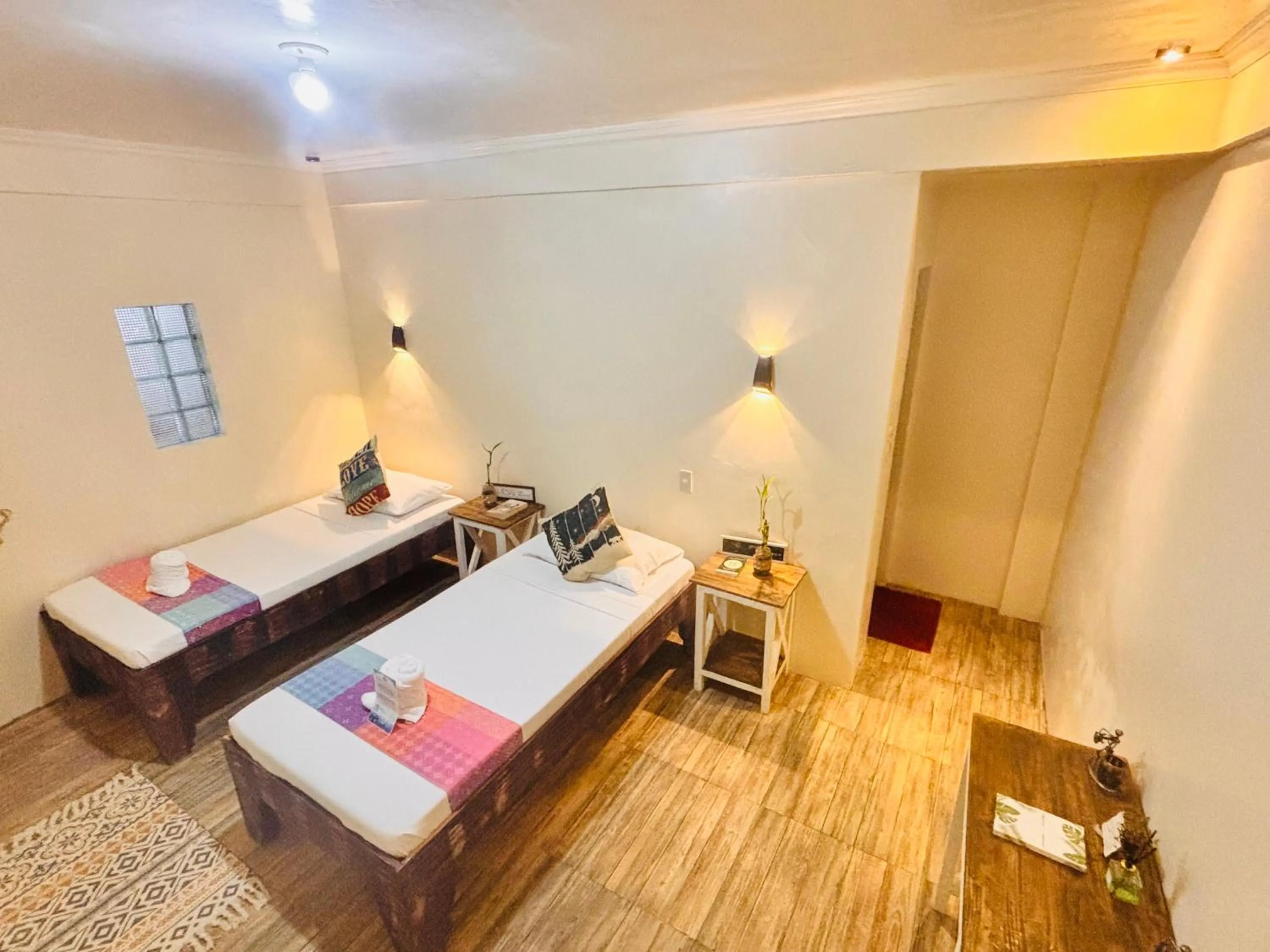 Bed in PamAnilao and Padoy's Dive Camp