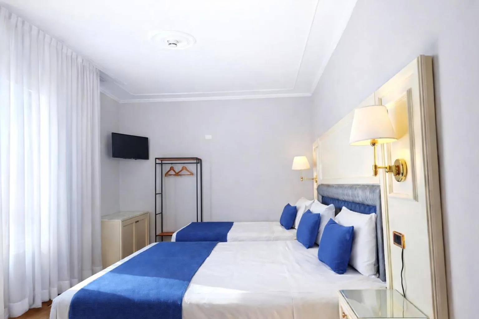 Bed in Hotel President Venezia