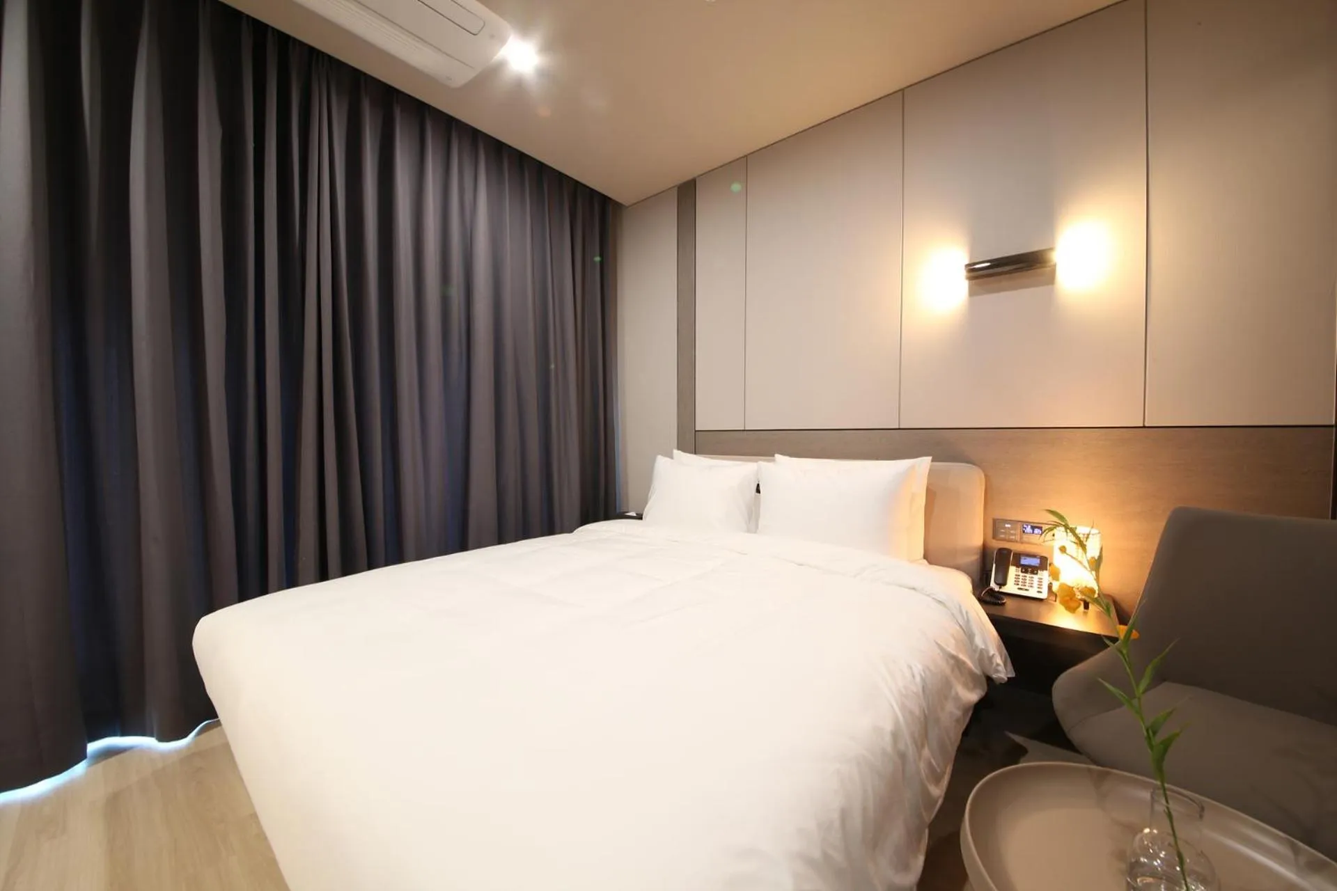 Bed in City Hotel the Busan Metro