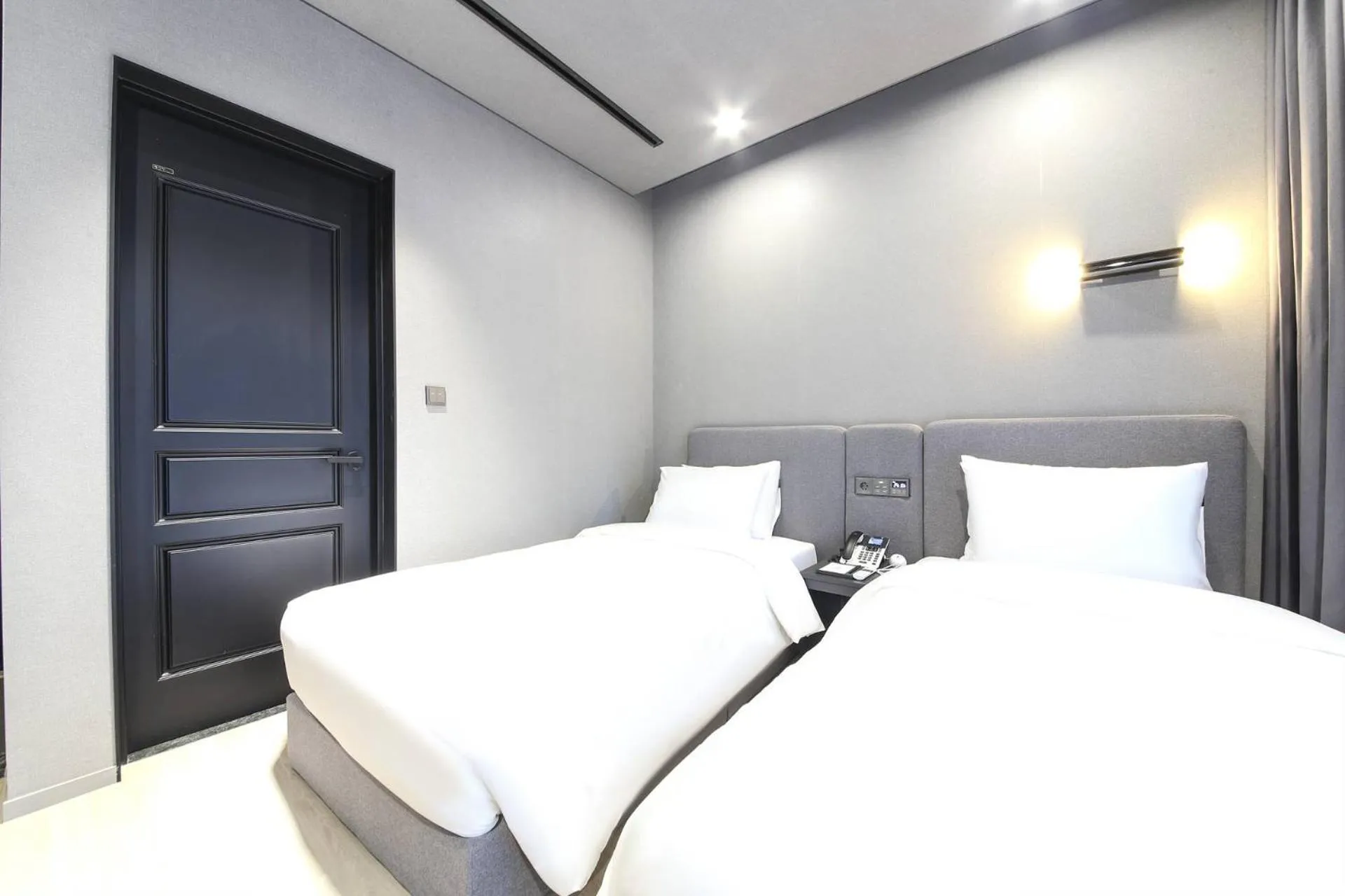 Bed in City Hotel the Busan Metro