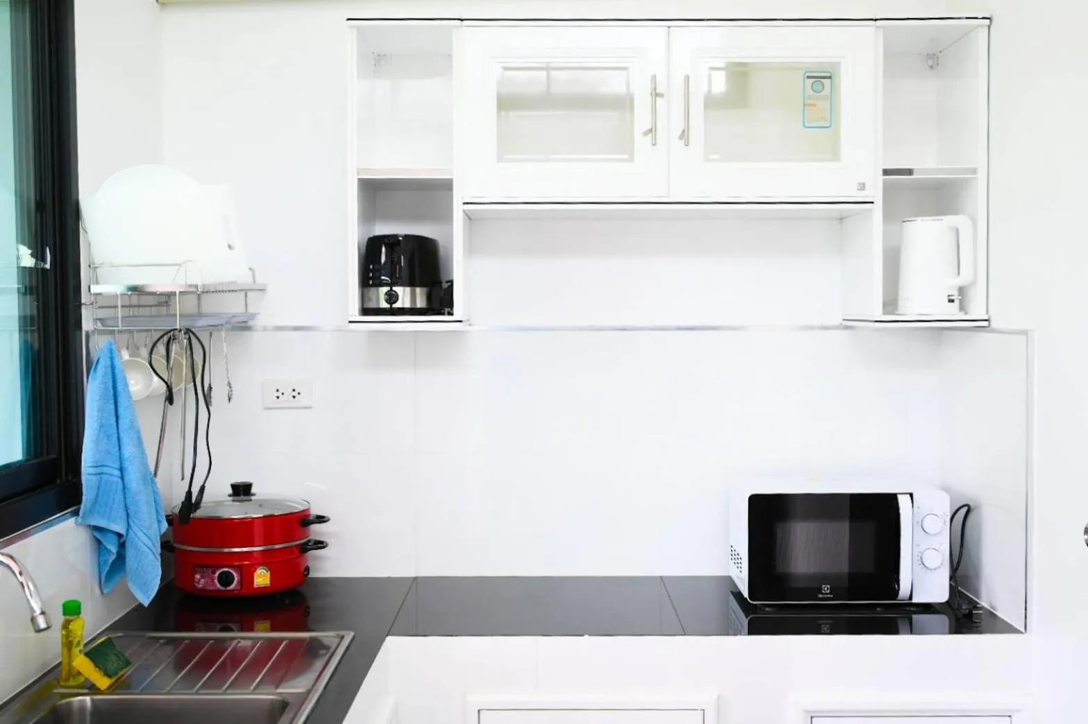 Kitchen or kitchenette in Baan Nern Khao Resort Pattaya