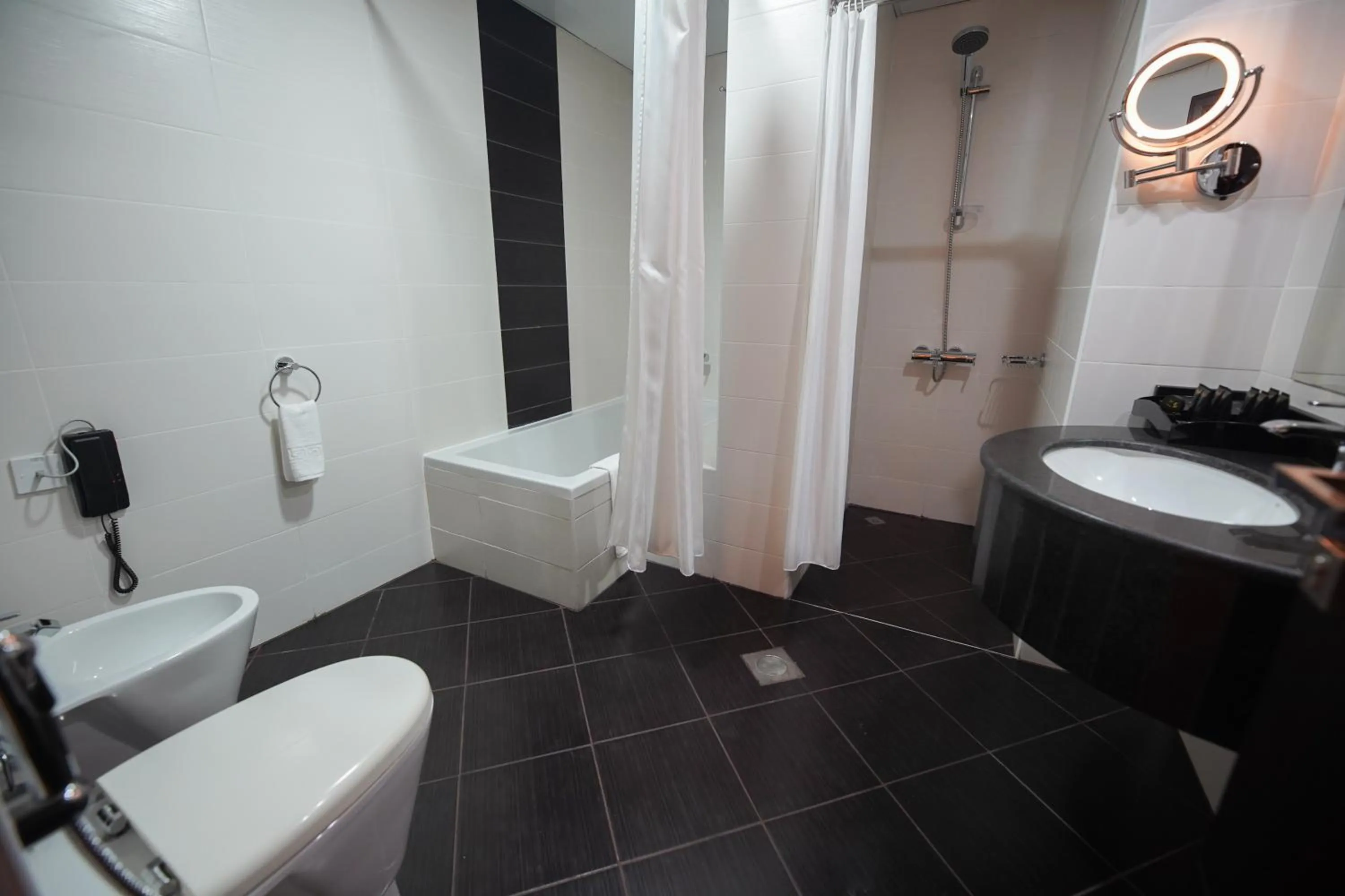 Shower in Grand Villaggio Hotel Abu Dhabi