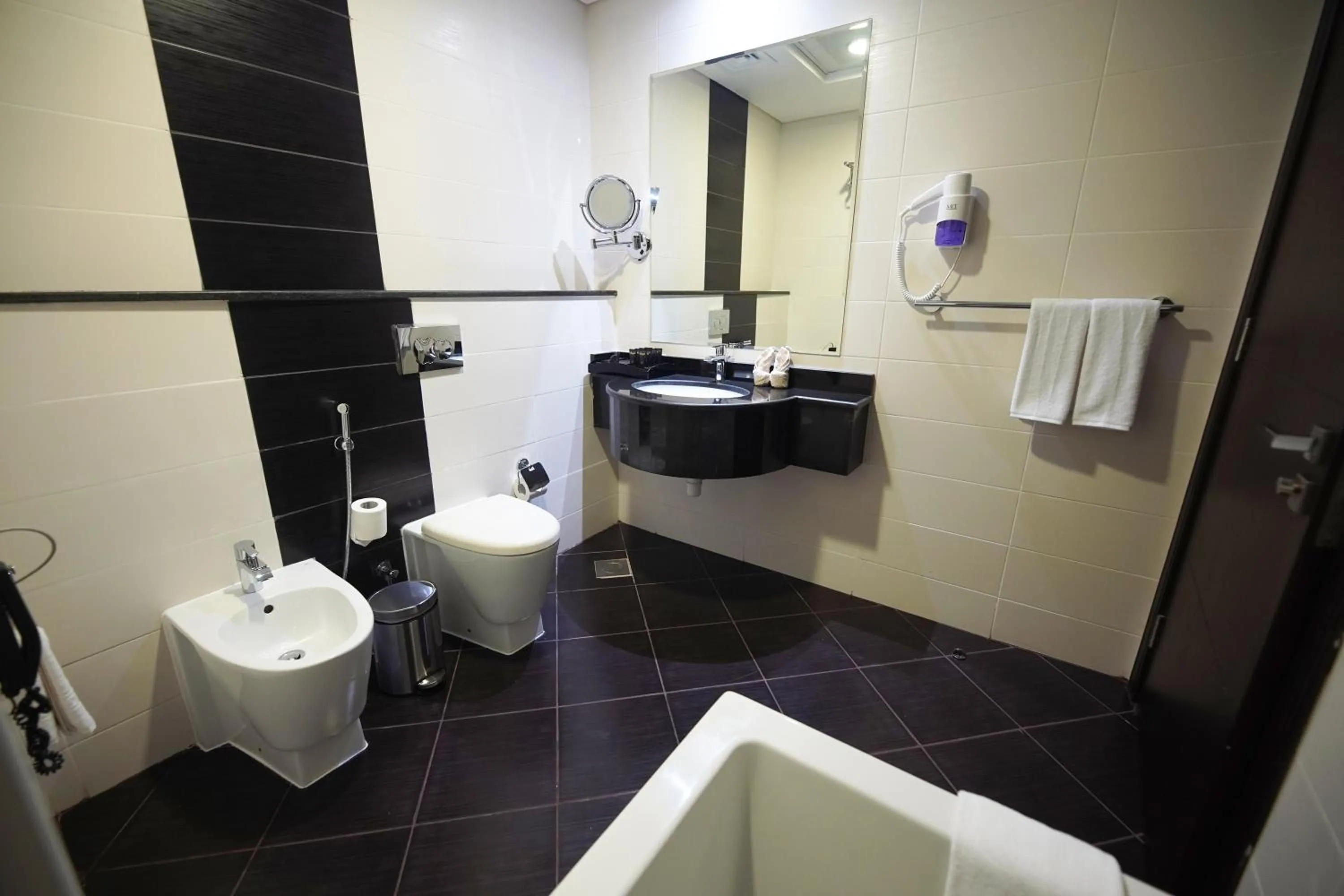 Bathroom in Grand Villaggio Hotel Abu Dhabi