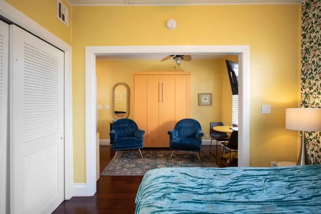 Bed in Duval Street Suite overlooking Duval with parking and pool