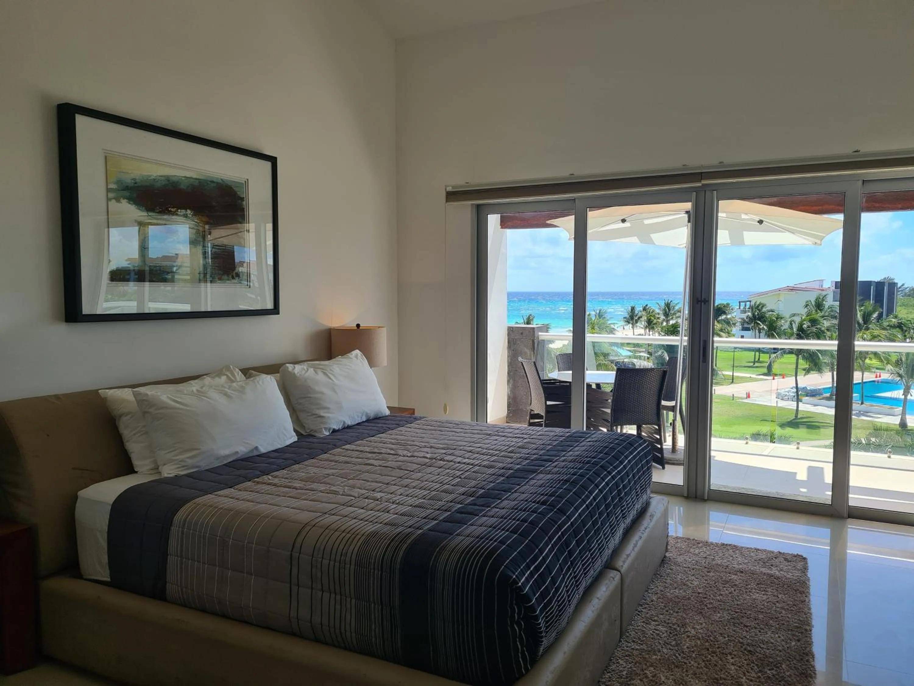Photo of the whole room in Luxury ocean view penthouse and private beach club